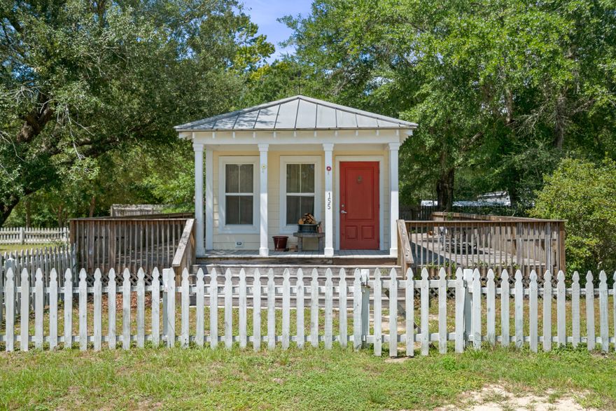 Income-producing Freeport cottages on four oak-shaded lots, just 15 minutes from the Emerald Coast's white sandy beaches! Built to withstand 165 mph winds, these charming homes feature metal roofs, Hardie board siding, double-pane windows, and energy-efficient insulation for low bills. Relax on multiple decks or porches, cook in kitchens with granite countertops and crown molding, and enjoy tile or laminate floors throughout. All tap fees are paid, and the lots allow room for two more additional homes. With established rental income and a prime location between Destin, Panama City Beach, and Fort Walton Beach, this property combines durability, charm, and endless income potential--perfect for investors or those dreaming of a coastal getaway lifestyle! This listing consists of a single parcel with four lots and two homes, with the total room count reflecting both properties. The seller is willing to consider selling each home individually: 155 Caswell Branch Road is listed at $205,000, and 161 Caswell Branch Road is listed at $189,000. Showings require a minimum of 24 hours' advanced notice due to tenant occupancy.