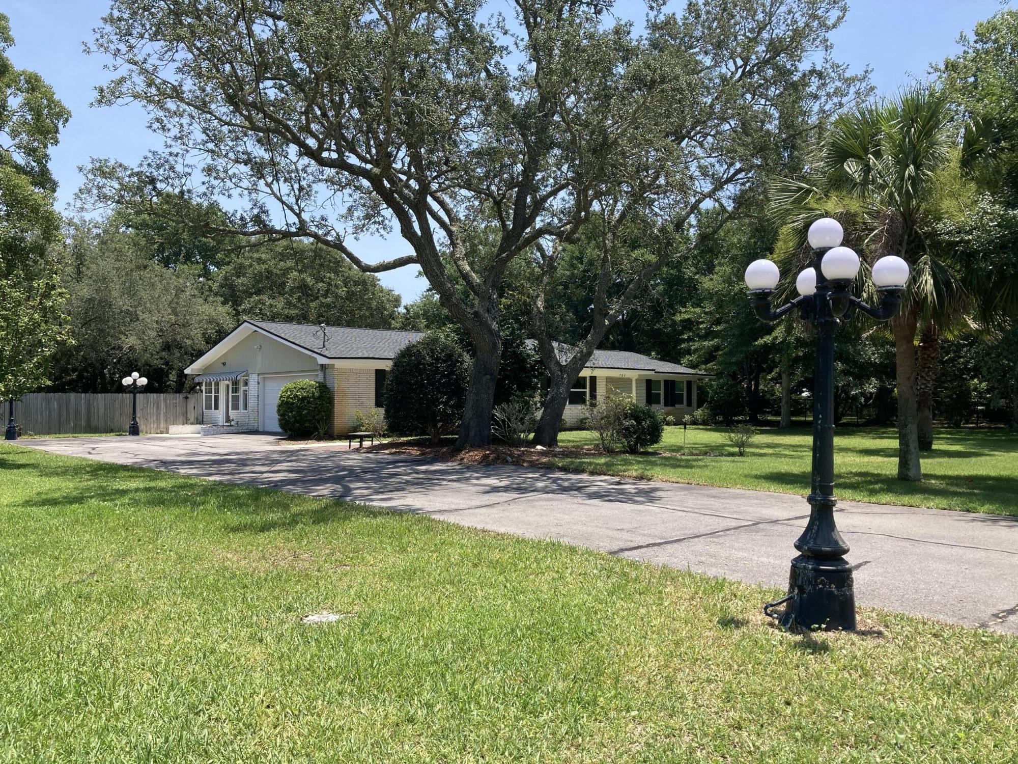 You have to check out this all brick, one story, 3 bedroom 3 bath home located on a large lot in Moreno Acres across the street from Joes Bayou!  New  HVAC system 2017, refrigerator 09/2021. roof 10/2021 and lawn pump 05/2022.   Property is large enough for the existing vegetable garden and a pool if desired.  Buyer to verify all square footage.
