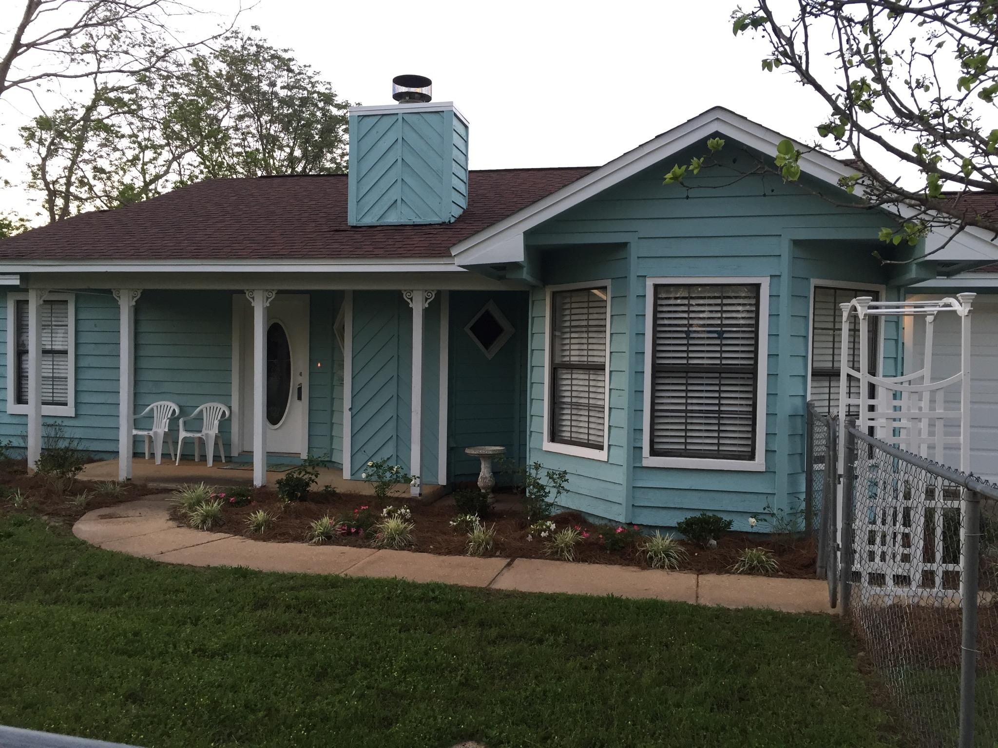 REMODELED and packed with CHARACTER and amazing finishes, this Florida Cottage is ALL NEW inside and features vaulted ceilings and 2 car garage!Don't let the sqft fool you, this home feels SPACIOUS! New Ceramic wood look tile throughout, new carpet in the bedrooms, brand new kitchen with expresso Cabinets, sparkling QUARTZ countertops, marble and glass tile backsplash, and NEW stainless steel appliances! Front loader washer dryer included! The eat in kitchen features a vaulted ceiling breakfast nook with bay windows! The living room features a high ceiling with double ceiling fans and a fireplace! The master bedroom has a soaring wood board and batten ceiling, chair rail wainscoting, and a private bathroom with modern high end sink, granite top,marble and glass tile backsplash and walk in