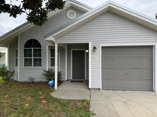 Welcome home to the loveliest 2 bedroom 2 bathroom in the heart of Destin! This large living room includes vaulted ceilings, tile flooring, wood burning fireplace that flows into the kitchen. The spacious master bedroom is situated at the back of the house, has a walk-in closet with master bathroom that includes tile shower. Spacious guest bedroom with large closet is steps to the updated guest bathroom. Head out back to a fabulous covered patio with a fully fenced back yard that has plenty of room to entertain. Washer & dryer hook-ups are located in the One-car garage Pets welcome!