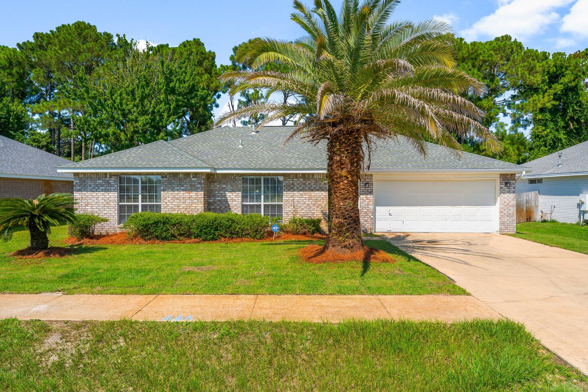 Heart of Destin! Home located in cul-de-sac with private and spacious fenced backyard with patio. Beautiful open floor plan with cozy wood burning fireplace and hardwood floors in living room. Enjoy close proximity to shopping, restaurants and the beautiful Destin Harbor. 2.2 miles to Joe's Bayou public boat launch. *Buyer to verify all listing information and measurements.