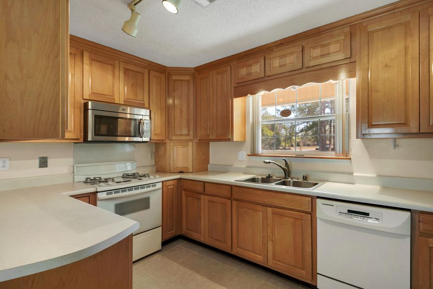 MOTIVATED Seller, 1 Owner, and Move-in ready! Freshly painted ceilings, very well maintained 3 bedroom, 2 bath home centrally located in the heart of Niceville. Home has new windows, a super large living room with gas burning fireplace for those cool winter nights, an updated kitchen, a bright and sunny beautiful Florida Room that over looks the large fenced-in back yard, with pleaded privacy shades, a screened-in porch, and a 2 Car Attached Garage. Buyer to verify all information deemed important to them. Shed conveys ''AS IS''