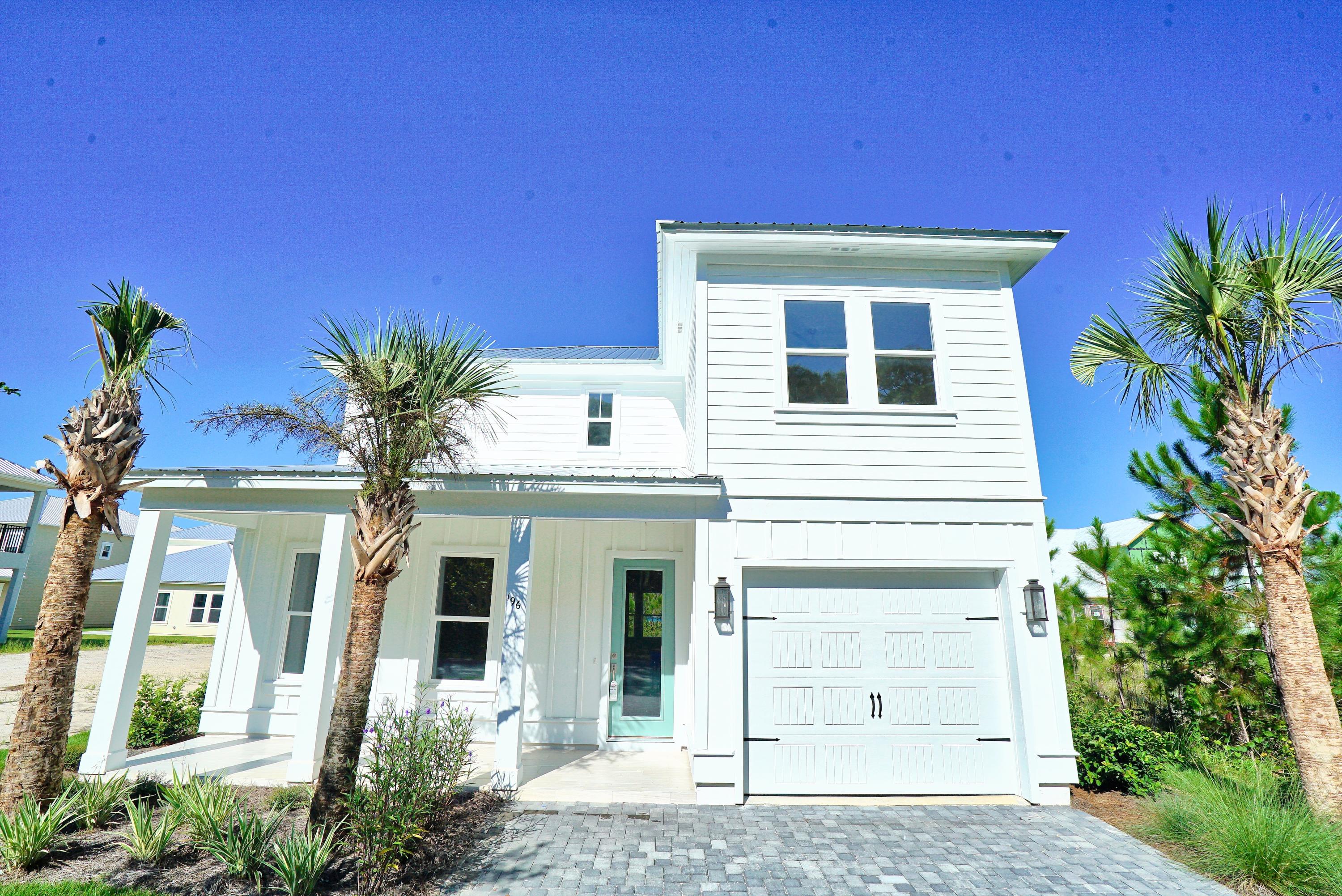 Get quality without sacrificing price and proximity to the beach! Tucked away behind the upscale beach community of Frangista Beach lies The Villas of Frangista. This charming gated subdivision features private cobblestone streets, a community pool, and brand new Beach Villas. 196 Lakeland has beautiful white siding, two covered porcelain porches, and towering palms. The interior has a modern open floor plan with the master suite on the main floor and three bedrooms upstairs. The kitchen has a massive granite island that blends seamlessly with the white shaker cabinets. This home has hardwood flooring throughout and porcelain tile in the bathrooms. This brand new Beach Villa has hurricane windows and doors, a metal roof, and comes with a Builder's Warranty.