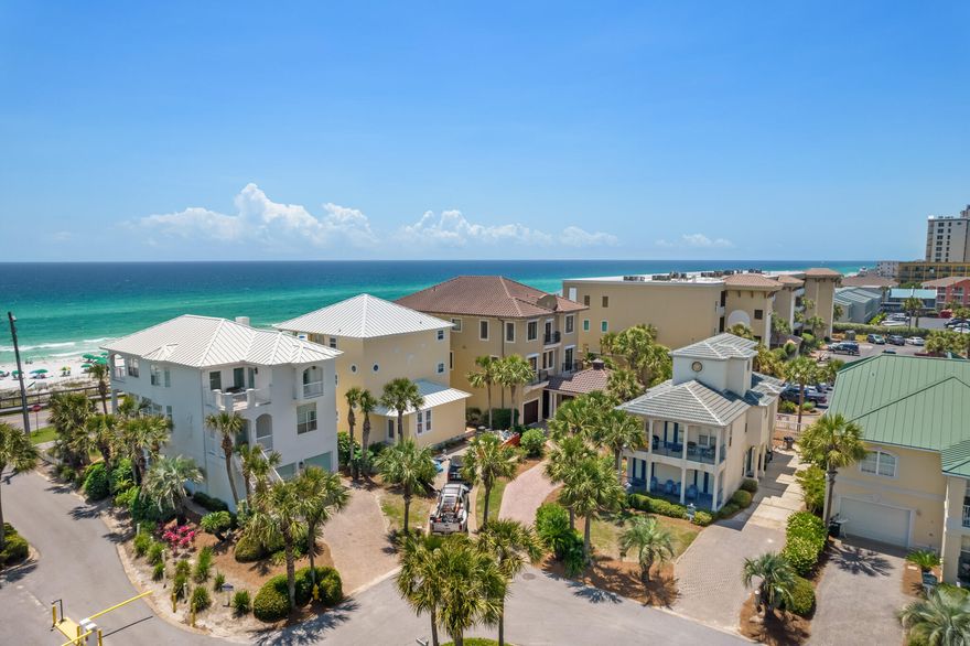Back on the market!! Come make these beach views yours! Check out this view for under 2 million and approx 250 feet to the White Sandy Beach! Known as ''ATTITUDE ADJUSTMENT,'' this spacious, colorful beach cottage is just across the street from Destin's powder white sands. With 4 bedrooms, 3.5 baths, 4 private balconies, Gulf views, AND all of the amenities of Maravilla, this dream home is the perfect getaway or amazing investment property. It's located near many of the area's best attractions. When you're not enjoying the pool, beach, gym, beach, or tennis courts, you can enjoy shopping and dining nearby. This home is the perfect package!