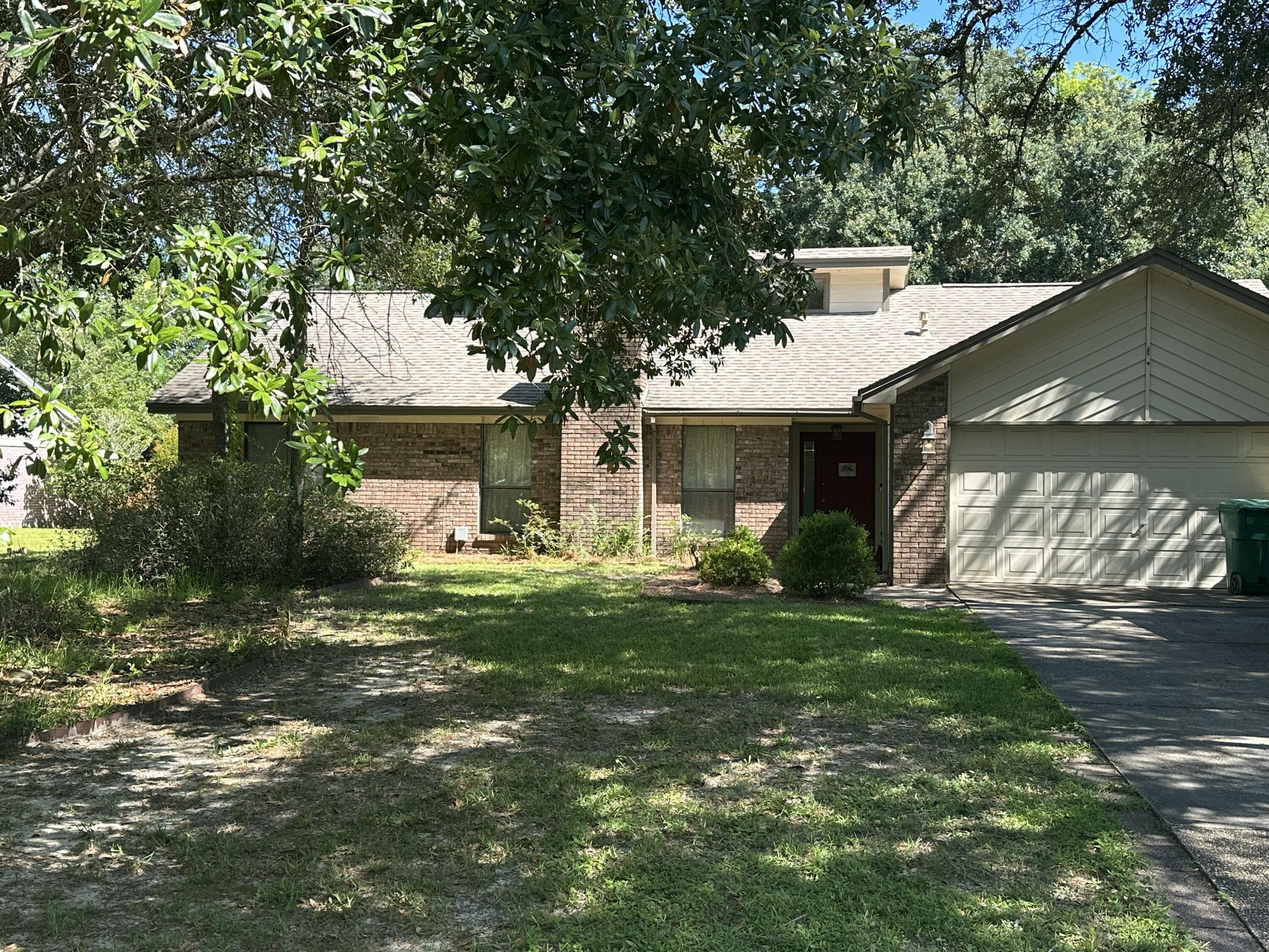 Comments: New Roof in 2025 Very open floor plan, wood floors in living and dining rooms. Tile in kitchen and bath. All windows replaced in 2007. New well in 2003. New 6 panel Doors and new white molding in 2007. Remodeled Fire place with marble surround in 2007. Privacy fenced in backyard. Approximately 2 blocks, very short distance, to Woodlands pool. Split Bedroom Plan. Large closets in all bedrooms. Master Closet is 17x8, and space galore.