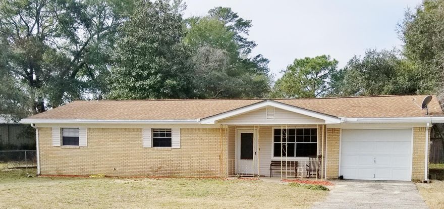 Price REDUCED DRASTICALLY! ALL OFFERS CONSIDERED! Freshly Painted! Well cared for 4 bedroom/2 bathroom classic Ranch on .42 acres.  Extra 408 sq ft newly remodeled for a cozy den or multi function day room, included in square footage. Separate laundry off kitchen. Copper Wiring. One car garage.  Nice, fully fenced, flat yard with flowering trees. Convenient to everything! Home Warranty Provided to new Buyer. Seller says, BRING OFFERS! ALL offers will be considered!