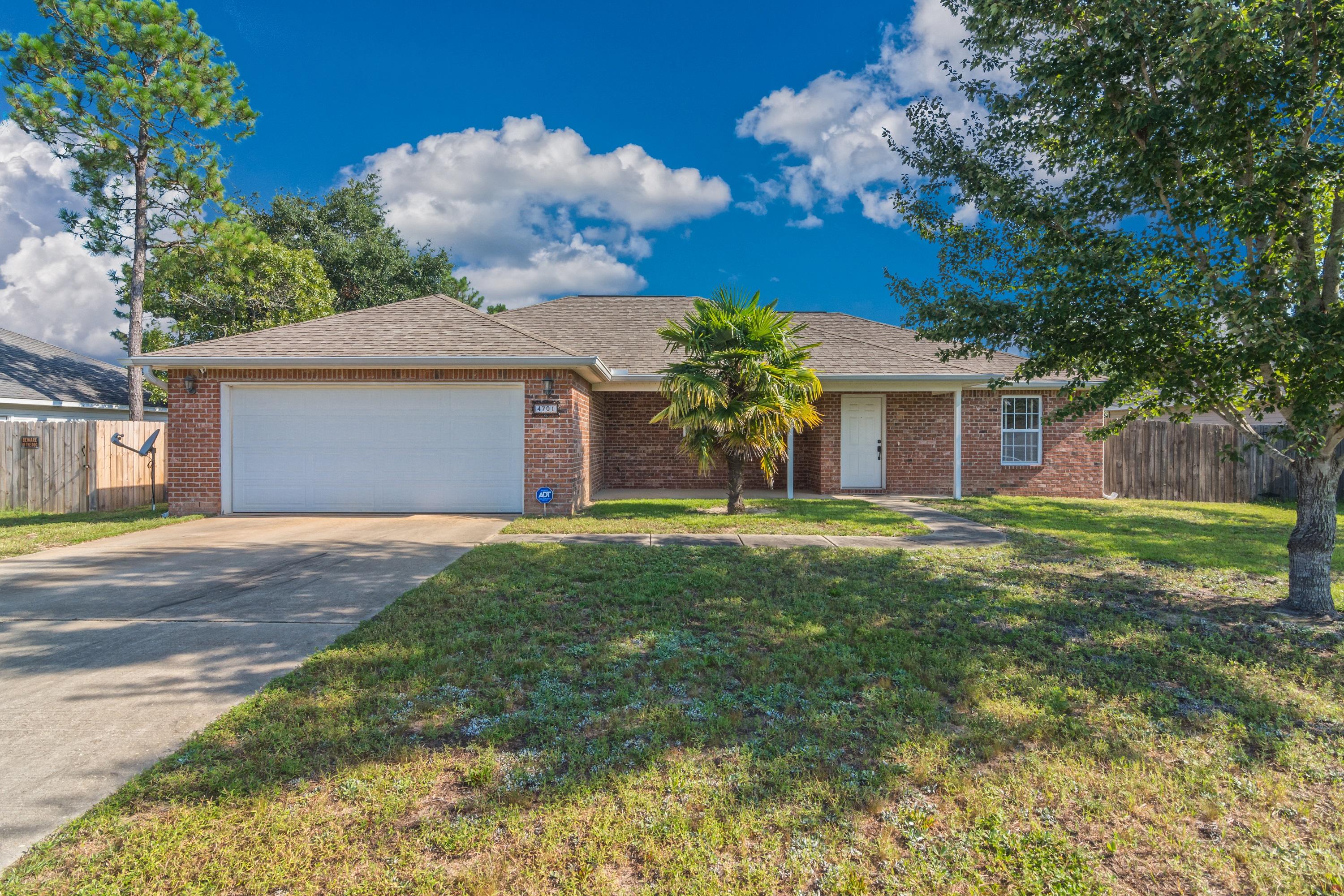 Welcome home! Come view this adorable 3 bedroom, 2 bathroom move-in ready home! This home has been lovingly cared for and is ready for new owners. With a completely open floor plan, upgraded cabinetry, countertops, and stainless steel kitchen appliances, you can move right in! Featuring tile in all the wet areas, a large master bathroom with separate garden tub, and a split bedroom floor plan. Best of all, this home is located on a PAVED road! The large manicured lot and screened-in porch is perfect for any pets you might have as well as great for entertaining. Schedule your appointment today!