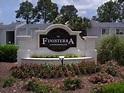 Finisterra is a great waterfront gated complex with pool, tennis, laundry room, and sauna. This is a ground floor unit with tile in living and bath area and carpet in the bedroom. Water, sewer and garbage are included in your monthly rent. Very convenient to bases, shopping and area amenities. Sorry no pets and no smoking inside unit.