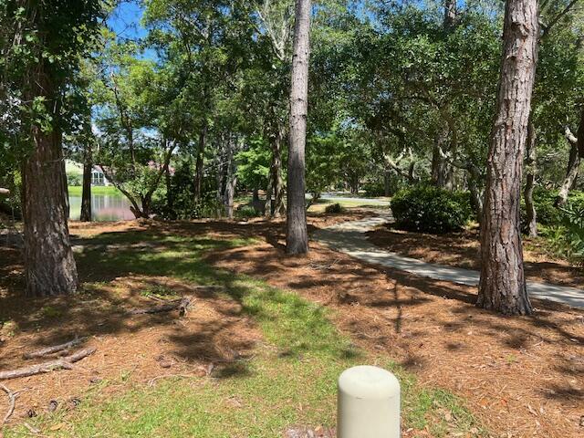 This is one of only two known large vacant uncleared lots with lake frontage and golf course views in the Regatta Bay Golf and Yacht Club Community. Utilities at the edge of property. Make this your dream home location in Regatta Bay Today!