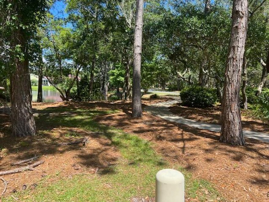 This is one of only two known large vacant uncleared lots with lake frontage and golf course views in the Regatta Bay Golf and Yacht Club Community.   Utilities at the edge of property.  Make this your dream home location in Regatta Bay Today!