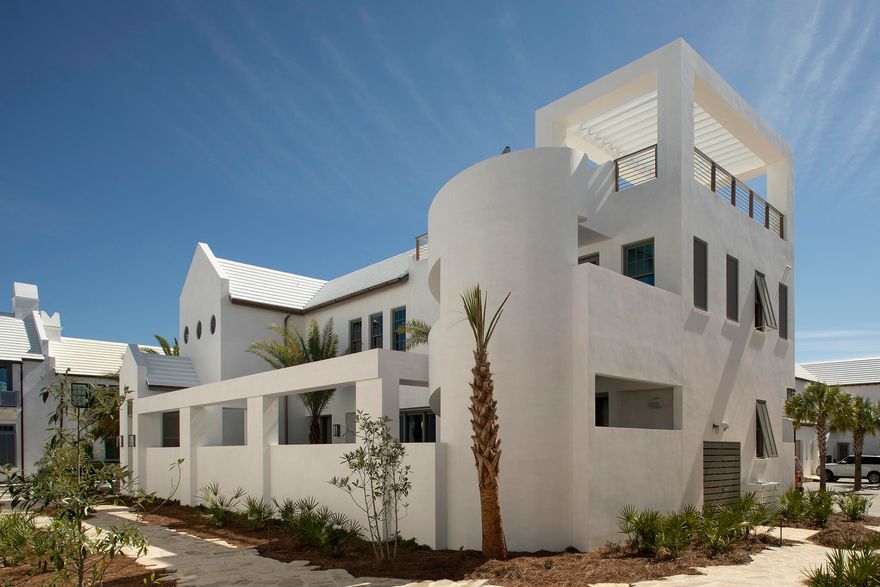A Boheme Design architectural firm delivers modern living lifestyle to interact with the peacefulness & solitude of the famed Palmera Park. Located south of 30a, the serenity of the park setting further enhances the homes design and elegance. This stunning property is within close walking distance to the Gulf Green. Livability is not questioned with this property. 62 S. Charles Street allows for full-time residency with the generous living aspects the home offers with its 3,845 square feet of conditioned living area and abundance of outdoor living. This 4 bedroom property consists of 2 master suites and 2 guest bedrooms, laundry rooms on each floor, a media room with beverage center, and captivating outdoor spaces.The kitchen, dining, and living rooms introduce the large cou
