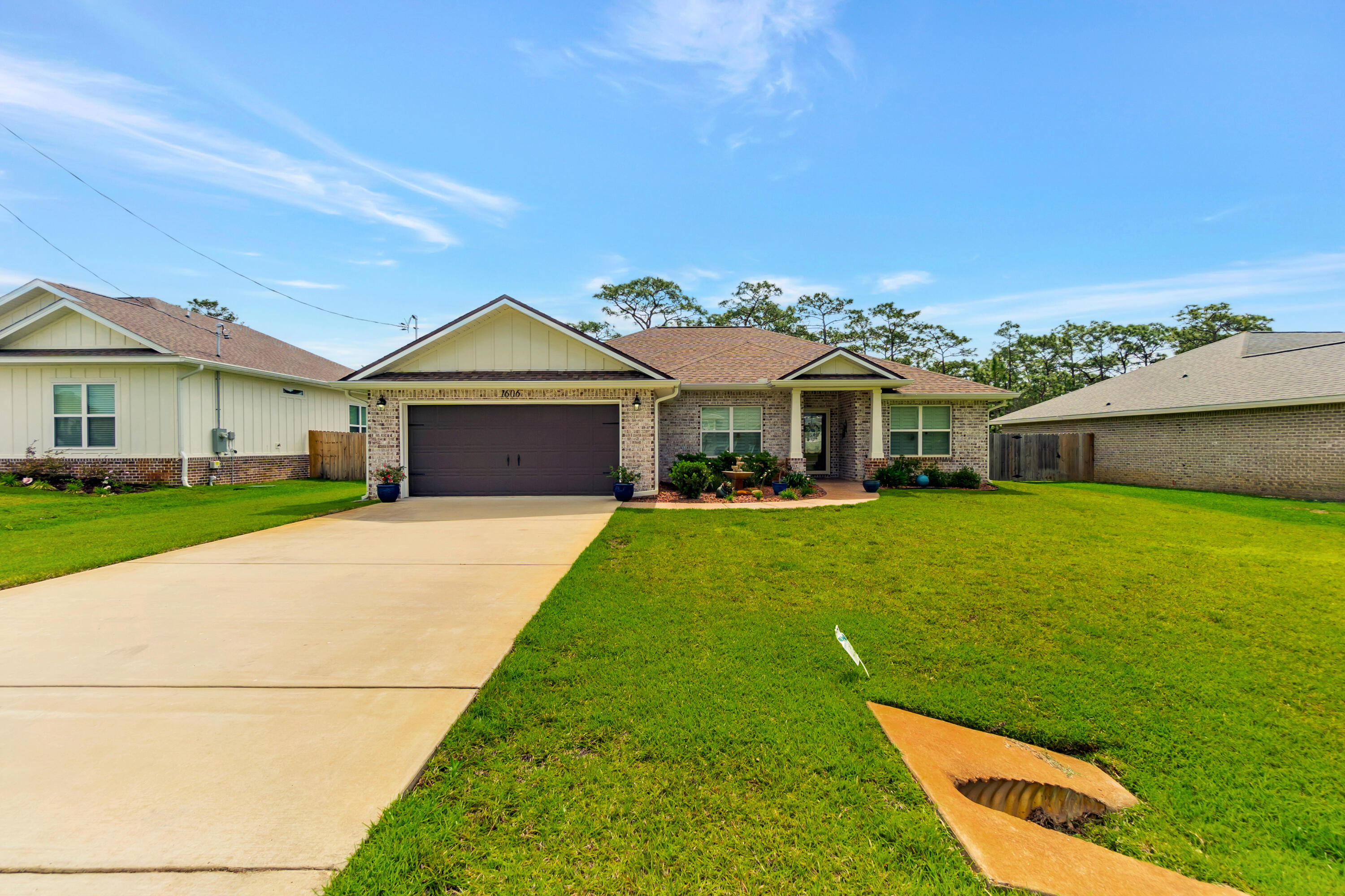 Beautiful curb appeal abounds with this all brick cottage style home with hardy board accent above eaves. Step inside to fully appreciate the amount of upgrades provided in this impeccably kept home. Level 3 granite countertops throughout, white shaker cabinets with soft close drawers, upgraded SS appliances, plantation shutters throughout, custom closet systems in Master & front bedroom, enclosed back patio with rhino shield application on floor in addition to covered extended patio with composite flooring. The WOW doesn't stop there, Master bath features dual sinks, lg. custom tiled shower w/glass doors while Master bedroom features tray ceilings, crown molding, LED puck lights, and ceiling fan. Both baths have wood look 12x24'' tile while high traffic areas and front bedroom feature Premium Vinyl wood plank floors and the remaining 3 bedrooms have very well maintained carpet. As an added bonus, fabric hurricane protection for windows are provided along with an irrigation system.
Woodlawn Beach public boat launch is approximately 3 minutes away!
This one is truly a find!