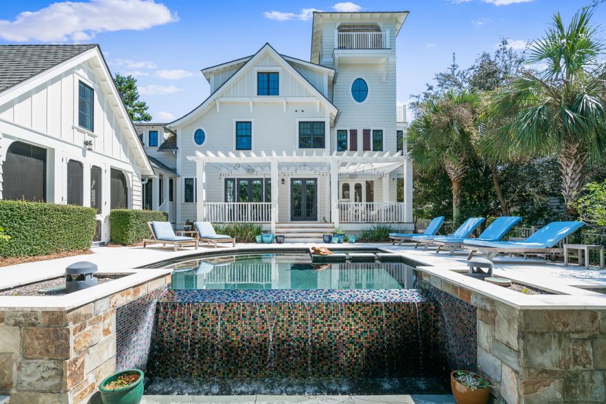 Gulf Views!!! Amazing custom built beach home located on one of the largest, most private lots in all of Watersound Beach! Designed by T.S. Adams and built by Gulfview Construction, this very special beach residence comes fully furnished and features an open concept layout with 4 bedrooms, 6 baths, 4,280 sq ft of heated and cooled space, multiple open and covered porches, a large 3rd floor bonus room with multiple sitting areas and workspaces, a lovely 4th floor tower with beautiful forever Gulf Views and a spectacular, oversized back yard with a Private Pool and Cabana Porch! The spacious and tranquil backyard truly is a rare gem in Watersound Beach and is arguably the centerpiece of this beautiful home.