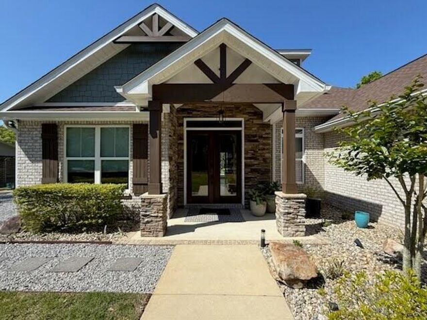 Tucked away along the canal leading to the bay, where the sky kisses the water and the breeze carries a scent of salt and serenity, lies a coastal masterpiece that's more than just a home--it's a lifestyle.This custom-built coastal canal retreat, only four years young, is a rare gem now available for the dreaming buyer. Spanning nearly an acre of pristine land with direct waterfront access, the property seamlessly blends the natural beauty of the bay with high-end design and luxury features. As you approach, the home's timeless elegance is immediately striking. Rustic wood beam accents contrast beautifully with crisp coastal finishes, offering a warm, welcoming aesthetic that feels both grounded and grand. Every inch of this property was designed to impressfrom the soaring ceilings to the hand-picked architectural details that give the space its undeniable "wow" factor. 

Step outside, and you'll find your private oasis: a spa-like pool that invites relaxation with its glistening water, lush landscaping, and seamless indoor-outdoor living. Whether it's morning laps or sunset lounging, this pool delivers resort-style luxury right in your backyard.

Love the water? You're covered. With a private boat lift and direct bay-side access, you can launch your day's adventures in momentswhether it's a peaceful cruise, a spontaneous fishing trip, or a sunset sail.

Inside, the home offers the perfect blend of open-concept living and intimate spaces. Large windows frame sweeping views of the water, while the interior layout flows effortlessly for both entertaining and everyday living. Pure indulgence.

This home isn't just rareit's one-of-a-kind. The kind of place where memories are made, where sunsets never get old, and where the waterfront lifestyle is yours to live every single day.