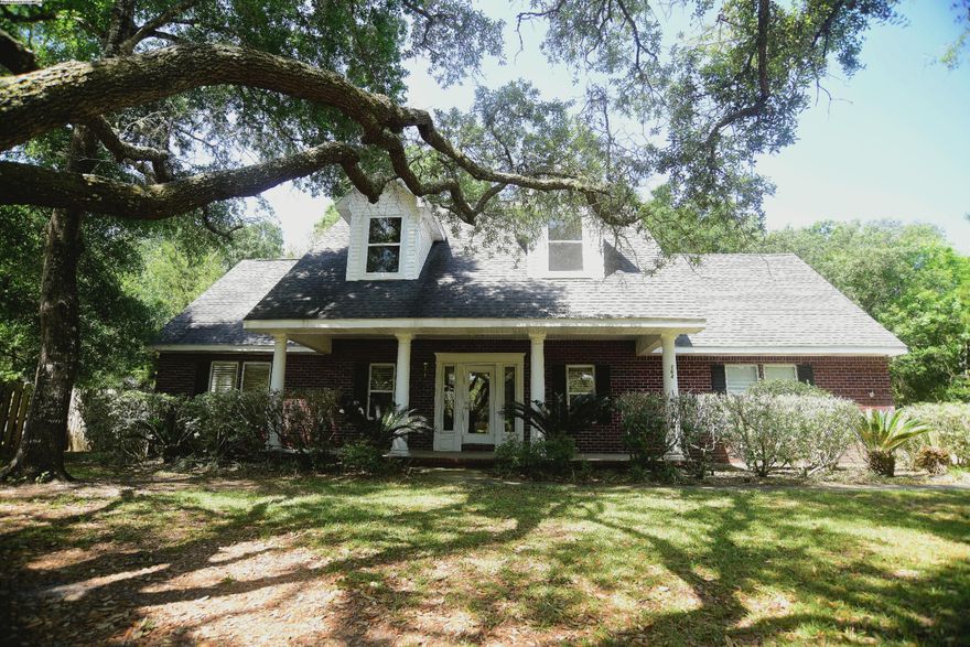 Great all Brick home on large lot in great location close to Bay and 25 minutes drive to Eglin AFB. Beautiful Landscape lot with lots of mature trees. This home offers a desirable open floor plan with Large Great Room with Fireplace & Large Kitchen area adjacent to Dining area. Hardwood Floors offers easy care in these areas. Off the Great room is Utility room with half bath. Master Bedroom downstairs with Master Bath, double vanity, whirlpool tub and separate shower. Upstairs are two good size bedrooms that share Full bath. Lots of additional storage in upstairs hallway. Bonus room upstairs would make great office or game room. Hallway doors open to Sun Deck overlooking back yard. NON SMOKING. PET LIMIT: 2 small-medium sized dogs with non-refundable pet fee. NO CATS. Any dog must be spayed/neutered, housebroken and current on all shots. Any person 18 years old or older must complete separate applications. Tenants required to carry renter's liability insurance while occupying the home.