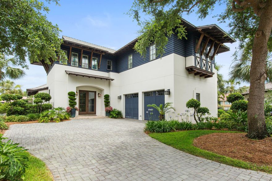 Back on market, no fault of seller. Located in the lovely Island Estates community, this four bedroom, four bath home is offered furnished with high end Maitland-Smith furnishings.  The waterfront home overlooks the lake and is just minutes from the gulf.  The large, open kitchen includes a sub-zero refrigerator, Wolfe stove, and Bosch dishwasher.  The downstairs features a separate breakfast room and dining room as well as the open living room.  The master bedroom is downstairs with an additional office that could also be a bedroom. The upstairs includes two bedrooms with full baths and a balcony overlooking the beautiful lake fountains. The outside porch offers a beautiful veranda leading to private pool. The home has a new roof, updated HVAC and water heaters.