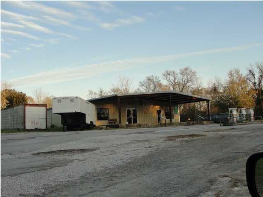 Country store on 3 acres. Previously sold feed, fuel and groceries. Walk in cooler, warehouse space, fuel pumps and tanks meet all codes and per recent inspection, have no issues. Shelving, checkouts and minimal deli equipment in place. Please verify with Walton County Planning Department any issues/questions you may have regarding the zoning/re-opening this store prior to contract/offer. Seller will finance at 5% interest, 20% down, amortized up to 30 years, with a balloon in ten years. Great opportunity to own your own country store in great location and area that needs a store!Property has been vacant for several years and will be sold in its current condition, with seller making no repairs. Two AC units and compressor for walk-in cooler are not functional at this time. Property is