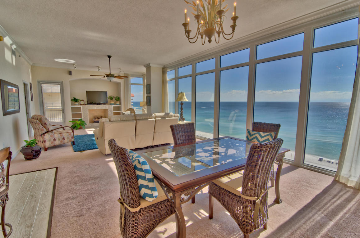 This 8th floor, end unit at Sterling Beach is one of my favorites and will surely be one of yours! You will love the incredible views from the oversized windows in the living & dining area, the romantic gas fireplace, the open floor plan, the deeded covered parking space and most of all, the lock out bedroom which has a small kitchenette, its own HVAC unit and its own balcony. This unit feels as though you are floating in the gulf. This condo is being sold furnished and rental ready. The Sterling Beach complex is in a class of its own. Beginning with the entrance with incredible palm trees to the beautiful grounds and the amenities.