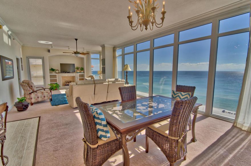 This 8th floor, end unit at Sterling Beach is one of my favorites and will surely be one of yours! You will love the incredible views from the oversized windows in the living & dining area, the romantic gas fireplace, the open floor plan, the deeded covered parking space and most of all, the lock out bedroom which has a small kitchenette, its own HVAC unit and its own balcony. This unit feels as though you are floating in the gulf. This condo is being sold furnished and rental ready. The Sterling Beach complex is in a class of its own. Beginning with the entrance with incredible palm trees to the beautiful grounds and the amenities.