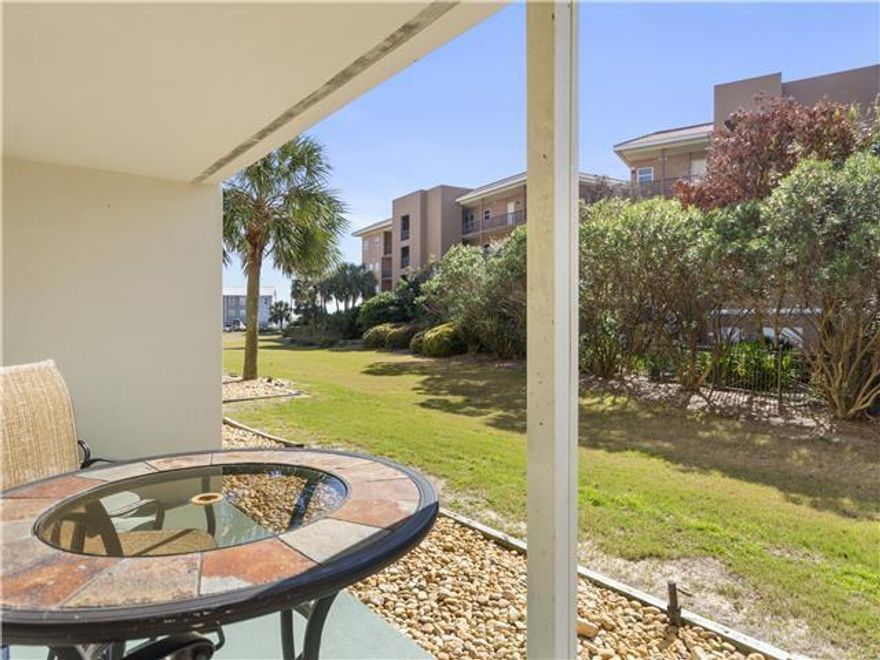 No Stairs or Elevator, Bottom Floor Condo. The Pool, the Green Grass and steps to beach. Fully Furnished, Rental Ready-Remodeled with the Beautiful Gulf of Mexico and Famous Restaurants just walking distance** Drive up and walk in. Amenities include Heated Pool, Tennis Courts, BBQ area and lush grass outside your door. Updates: Kitchen appliances,  LVP flooring, Water heater and HVAC completed 2022.  The Perfect Condo location just steps to the Gulf to enjoy the Beautiful Blue Water & Sugar White Beaches. The Building inspection are paid  & the Condo looks Amazing.  This is The Perfect Time to Invest in Florida. In March the visitors come down to Relax & Rejuvenate.Be Ready this year to have your own place at the beach.  Mortgage Lenders in Remarks for best financing opportunity
