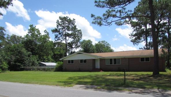 Centrally located in Crestview, corner lot with half an acre on Texas Parkway! This house has a lot of square footage since the garage has been converted and can be a large family room or master bedroom and measures 20X20. Upon entering the house you are in the large living room with newly replaced windows looking out over the front yard. There is a pass through from the kitchen to the living room with a breakfast bar and decorative spindles.The laundry area is off the kitchen and offers extra storage. The master bedroom is a good size and there is a walk in shower in the master bath. The back yard has a chain link fence around it and there is a large workshop for storage and the patio is covered. Seller is offering a home warranty! Schedule your showing today!