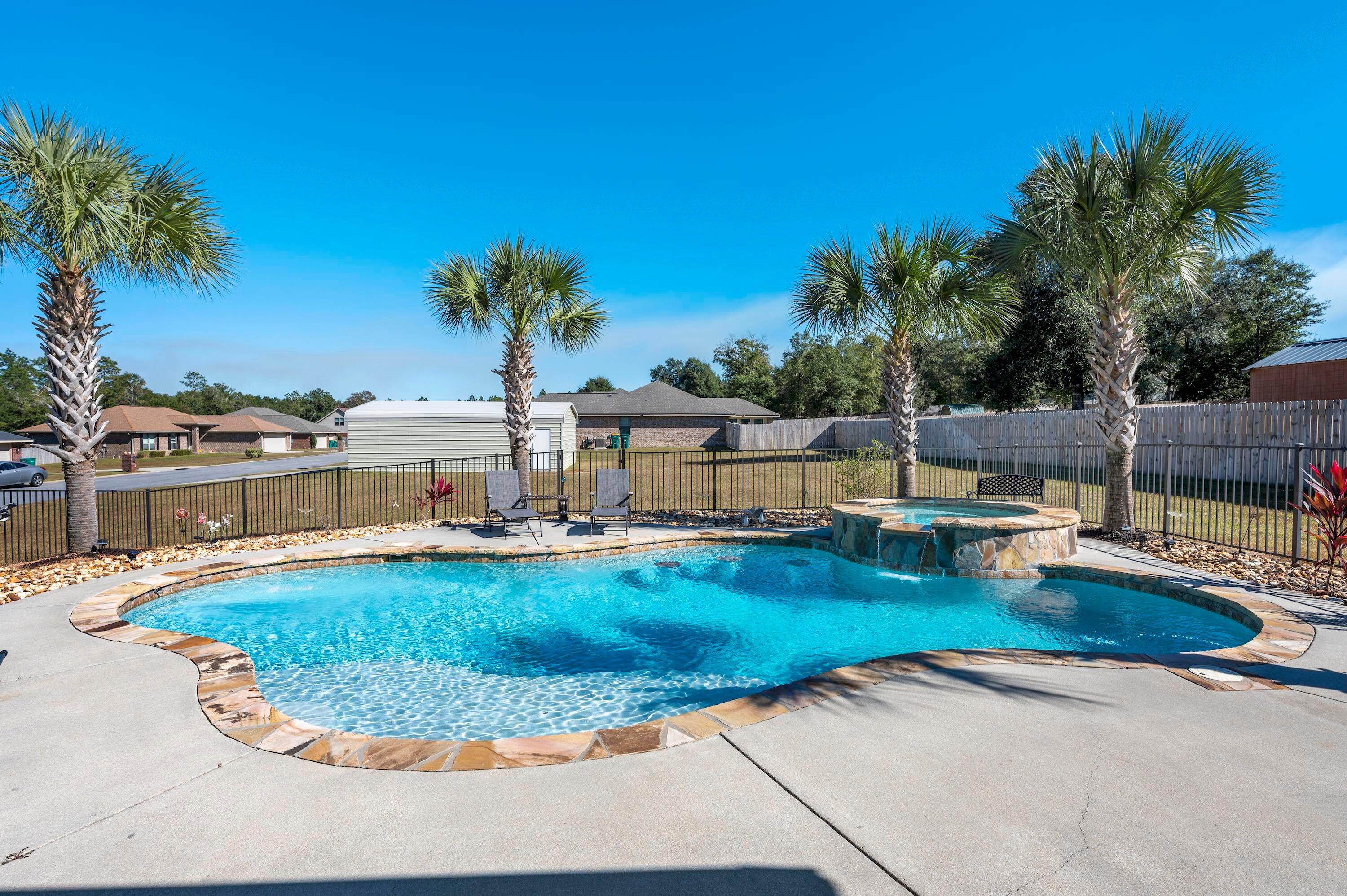 Backyard OASIS! Spacious turn-key ready premium lot 5 bd+ additional oversized bonus room, 3 bath well maintained like NEW dream home. Enjoy the large covered front porch, NO carpet with updated LVP throughout home including the 2nd floor and tile located in bathrooms. Upgraded granite countertops throughout and beautiful crown moulding on kitchen cabinets. Stainless steel appliances, real wood flooring on staircase, updated light fixtures and mirrors, surround sound capabilities, upgraded extended covered back patio. Master bath dual vanities, garden tub, walk-in shower, and large walk-in closet, recessed lighting throughout. Oversized shed previously used as boat storage, irrigation, gunite pool & spa, inground propane tank, palm trees, and landscaping. Post occupancy through 1/16.