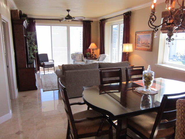Likely the nicest three bedroom condo in Ariel Dunes and on the Emerald Coast for the price. Completely redone in 2007(when new)with high end finishes including crown molding throughout - completely repainted with oil based enamel on trim and doors - eggshell walls - beige travertine floors with mocha tumbled marble diamonds - slab travertine in master bath - granite tops in other two baths - all upgraded plumbing fixtures and light fixtures - $50/yd carpeting in bedrooms - framed mirrors - thick plate enclosure in hall bath with travertine walls - SOLD FULLY FURNISHED - (premium furnishings - not condo package)- Built in 2006, Ariel Dunes is one of the nicest developments along the Emerald Coast. Seller has ownership interest in property