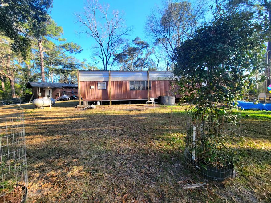 Waterfront single wide mobile home on a canal leading to the Choctawhatchee Bay!  Home has been renovated  with 1 bedroom and nd a new bathroom.  It is a 12x652' single-wide with many updates, new birch kitchen cabinets, new flooring in kitchen living and dining room.  Built over metal roof with wind rating of 200 mph, new breaker box, central air/ and heat.  Well landscaped yard partially fenced, city water and septic tank.  Also includes a large 16x20' metal workshop/laundry/garage with cement floor, with water and electric box.  County road with cracked asphalt, located at the end of Jennings Road next to Walton County boat launch....by boat its  10 minutes you can be in the bay fishing!   You can be at the South Walton Beaches within 10 minutes.  THIS IS A CASH ONLY SALE.