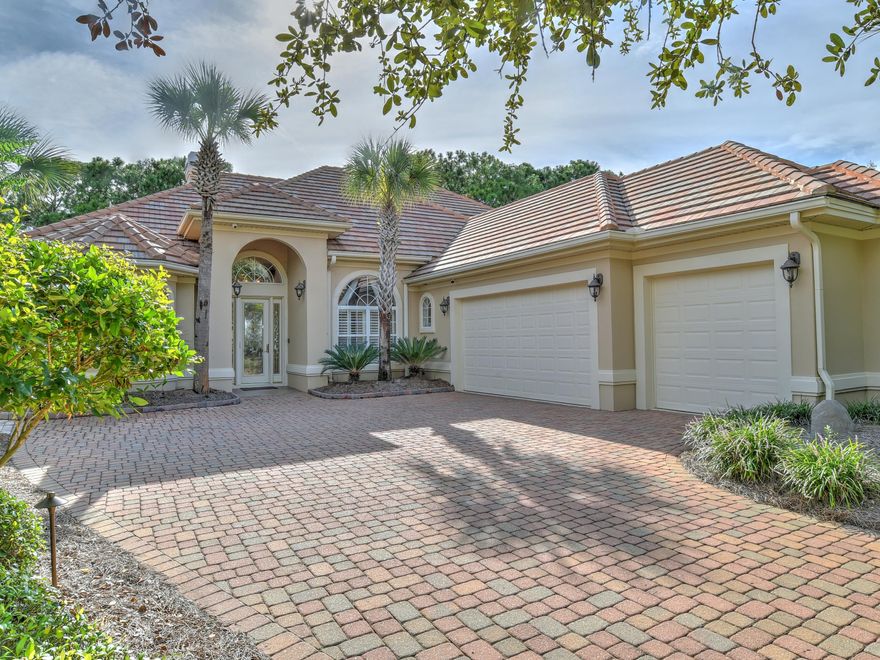 Situated on the 5th hole of the Regatta Bay Golf Course, this fabulous home overlooking a lake, features 4 bedrooms, 4 baths and 3,013 sq. ft. of inspiration. Let's not forget the amazing pool/hot tub and generous screened outdoor living space. When it's warm outside, just turn on the misters and that will keep you cool and comfortable. In the evening, relax with your favorite beverage and soak in the beauty of the lush and lighted landscape.  As you enter the front door you'll find the dining area on the right and the living area with gas fireplace and views of the lanai and the pool area.  Love to entertain? It's easy to bring the outside in by opening up the triple stacked sliders. The kitchen has been renovated to include granite counter tops, subway tile backsplash, refaced kitchen cabinets, and stainless appliances. The kitchen also offers a large breakfast bar, island and breakfast nook.  There are 3 bedrooms on the first floor.  One is currently used as a home office.  The master suite has two large walk-in closets & a private entrance to the lanai. The master bathroom features a large walk-thru shower, 2 dressing areas, his & her vanities, & jetted chromotherapy Jacuzzi tub..  Up the stairs you're sure to be delighted with the large media room and the forth bedroom which is used as a second home office and a separate bath.  There is also a balcony, perfect to enjoy at anytime of day when you just need to take a moment to breath.  Regatta Bay Golf and Yacht Club is a gated community in Destin, Florida, that features boating, golf, clubhouse, tennis, swimming, shopping, dining, and many social amenities.  Destin Commons and Whole Foods grocery store is in close proximity.  The all-inclusive neighborhood was designed so residents can live, shop, dine, play, and never leave Regatta Bay! Who could forget the sugar white sand beaches and emerald green Gulf waters, and fabulous deep sea fishing we are so known for.  All room dimensions to be verified by buyer.