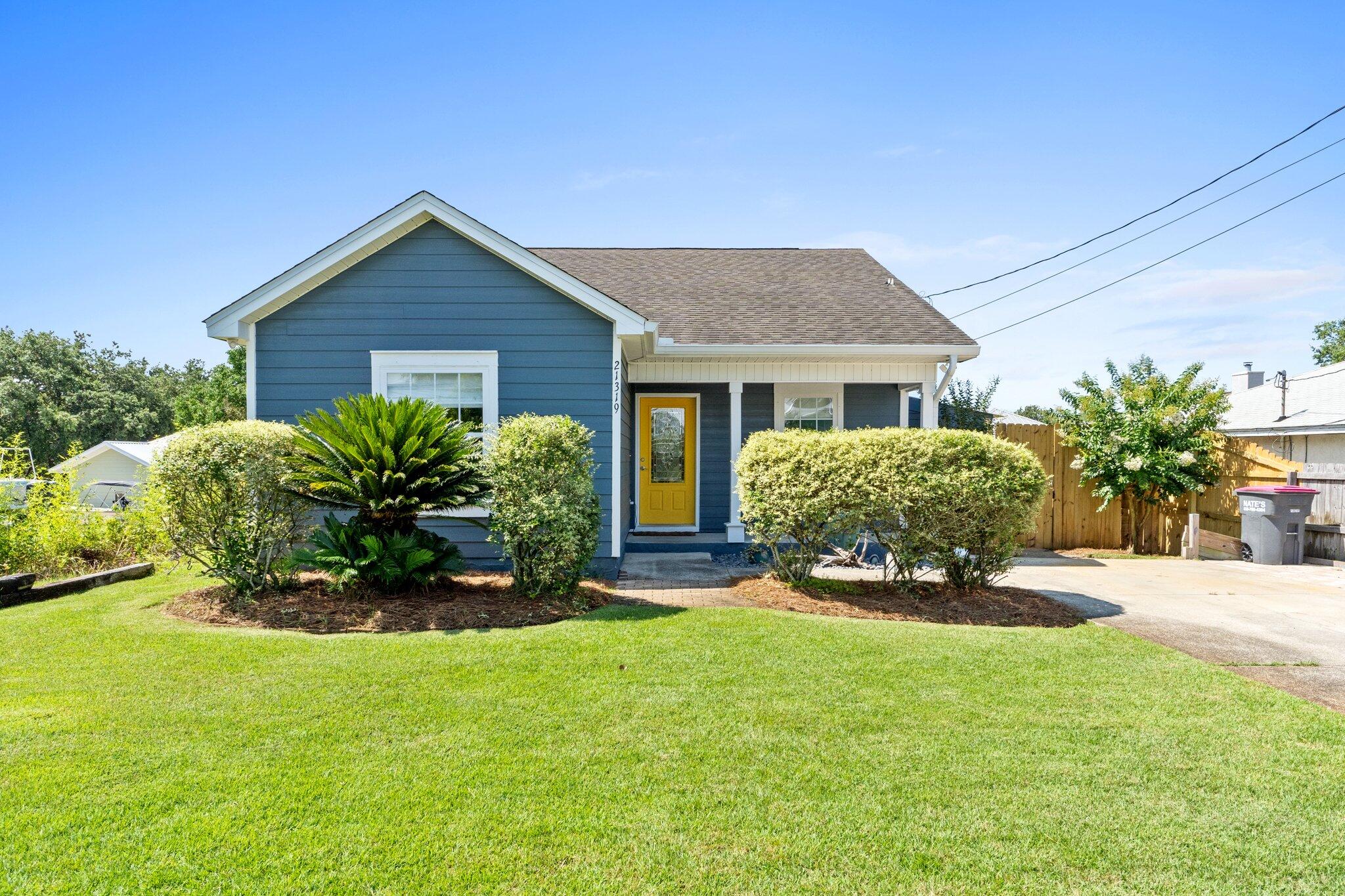 This charming 2-bedroom, 2-bathroom home is nestled just 4 blocks away from the world's most beautiful beaches! Location allows for access to great dining and shopping options close by, as well as quick access to the 30A area. Step inside to discover a cozy yet spacious layout, perfect for both full-time living or as a secondary home or investment property. Updated home in excellent condition. Ideal for investors, this property is situated in a short-term rental area, offering cash flow opportunities. The sellers are even open to selling the home furnished, making it turnkey for your convenience. Outside, you'll find yourself surrounded by meticulous landscaping in the front and back yards, creating an oasis for relaxation and enjoyment. Screened-in back porch is the perfect spot to relax