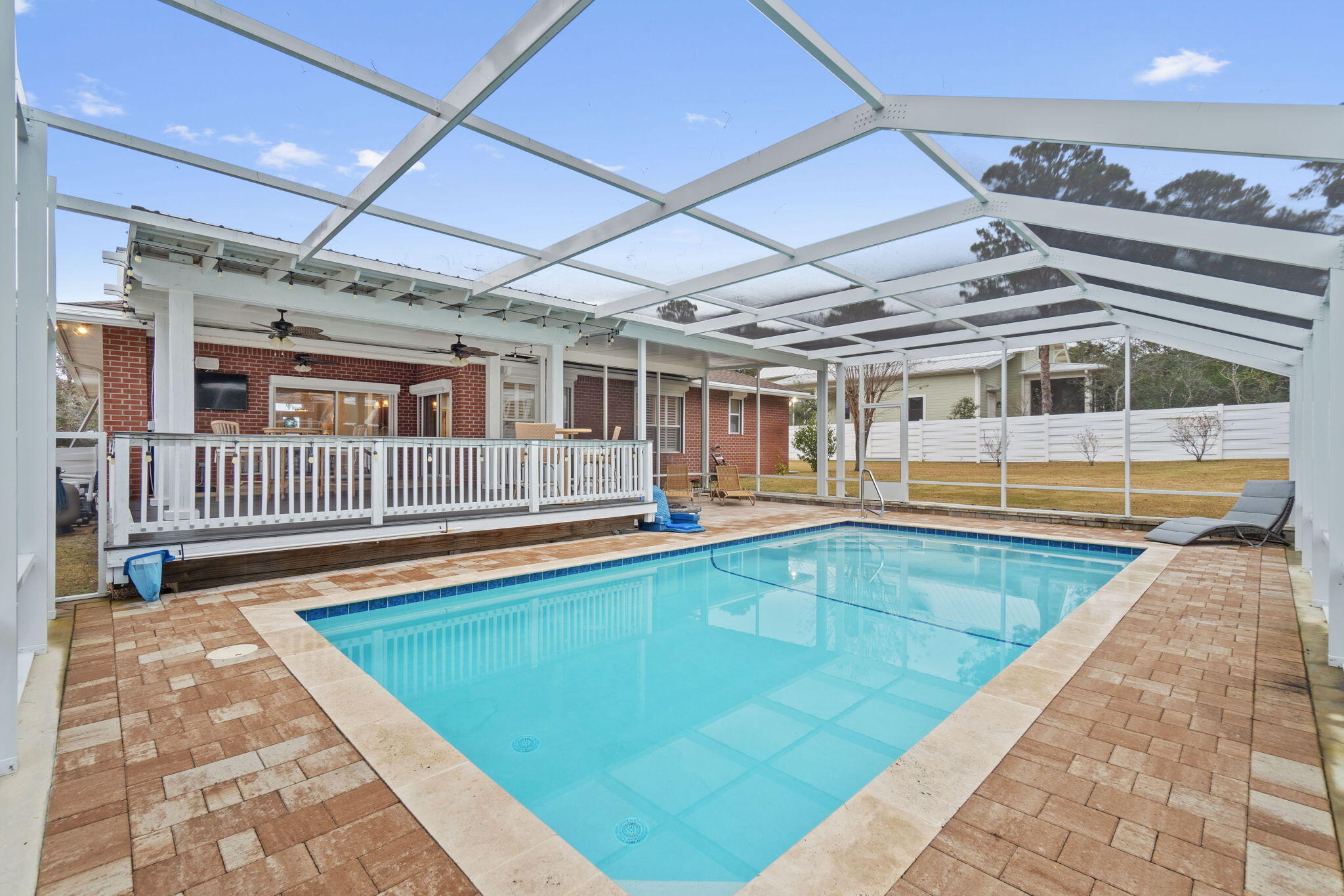 EASY SHOWINGBEAUTIFUL GOLF COURSE AND BEACH COMMUNITY HOME. The perfect 4 bedroom home with a large office and no stairs to climb. Thoughtfully upgraded ranch in desirable Santa Rosa Beach. NO FLOOD INSURANCE NEEDED - Short golf cart ride to Santa Rosa Beach golf course, the Gulf of Mexico and some of 30A's premier dining establishments. This recent upgrades to this home include hard surface counter tops in bath and kitchen, an inground pool, screened lanai, covered porch/patio, natural gas, tankless water heater, custom pave driveway and patios, hurricane shutters, whole house generator, electric car charger and outdoor shed/yard building. This home is a must see. Priced to sell