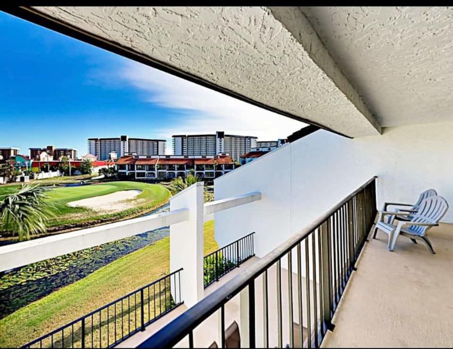 Condos in Phase 1 of Edgewater Golf Villas are the most desired condos because of the close proximity to the Gulf and views of the 8th fairway. This condo is one of the largest in the golf villas and boasts 1863 square feet with two bedrooms and three full bathrooms. This corner unit is very convenient to the main gate and the beach overpass. The unit features extra large rooms, a utility closet in the kitchen with full size washer and dryer, a separate pantry closet and loads of counter space, cabinets, and room for all your kitchen needs. The living room and dining room both open up to a huge balcony and deck area that is 19 ft. x 26 ft. (the size of a small unit) and both bedrooms are upstairs and each has its own balcony and bath.