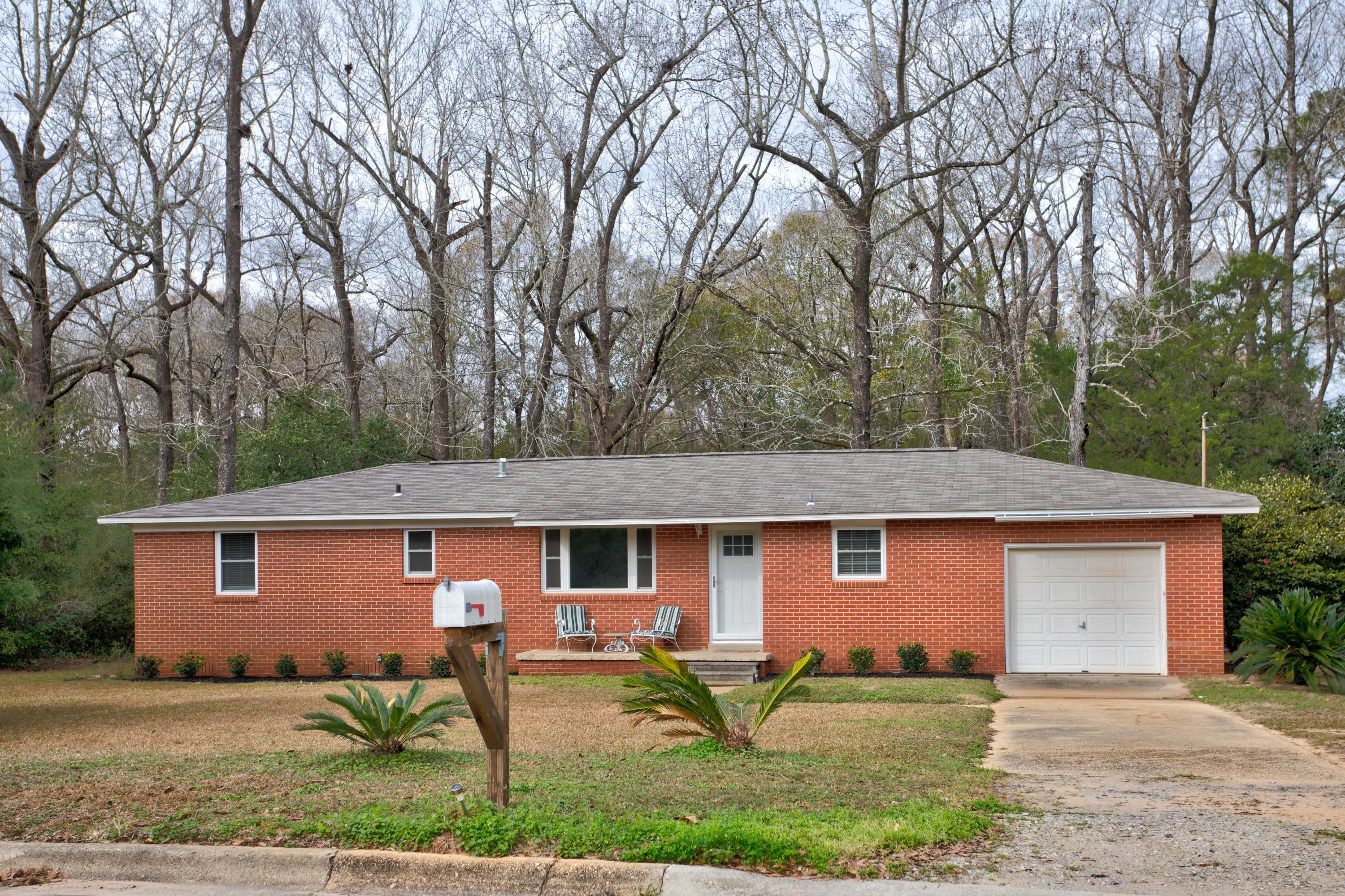 MOTIVATED SELLER!! This 2 bedroom 2 bathroom is a quaint home with original hardwood flooring and renovated kitchen including quartz counter tops and stainless steel appliances. The roof was replace 11/19 and the whole house has brand new windows. The master suite includes new carpet, updated master bath and walk-in closet with cedar plank walls. Enjoy Friday night football games at the local high school less than a mile away, and your weekends at the movies that are just across Highway 85. Or just sit on your back porch and enjoy your quiet neighborhood while listening to the birds sing. This is THE perfect home for the simple living you have been longing for!