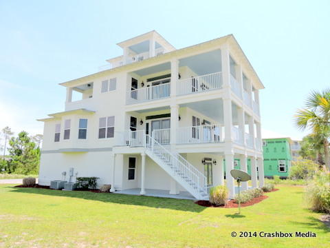 OWNER FINANCING CONSIDERED FOR QUALIFIED BUYERS! Masterfully designed home is right on the pool. With an elevator, over 5,899SF including all balconies and porches this large home offers plenty of room for you and your guests. This home could be your primary residence, secondary residence, or a rental property. Do you want to live at a resort year round? Buy this home and you will live on a spectacular 14,400 SF multi-level resort style pool. It boasts Roman bath style rock formations reaching heights of 20 feet where 10 waterfalls cascade down through lush landscaping. Cypress Breeze Plantation is located by specialty shops at Gulf Place and Grand Boulevard Town Center and the beach at Ed Walline Gulf Front park on the Gulf of Mexico. All information is approximate. Sold As Is.