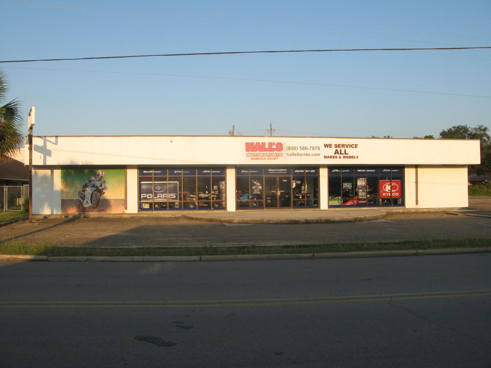 Retail building with large glass store front with large parking lot. Located across the street from Sun Plaza shopping center that has Publix, TJMax, Office Depot. Additional 3,000 sqft warehouse buiilding on rear of property might could be for lease as well.