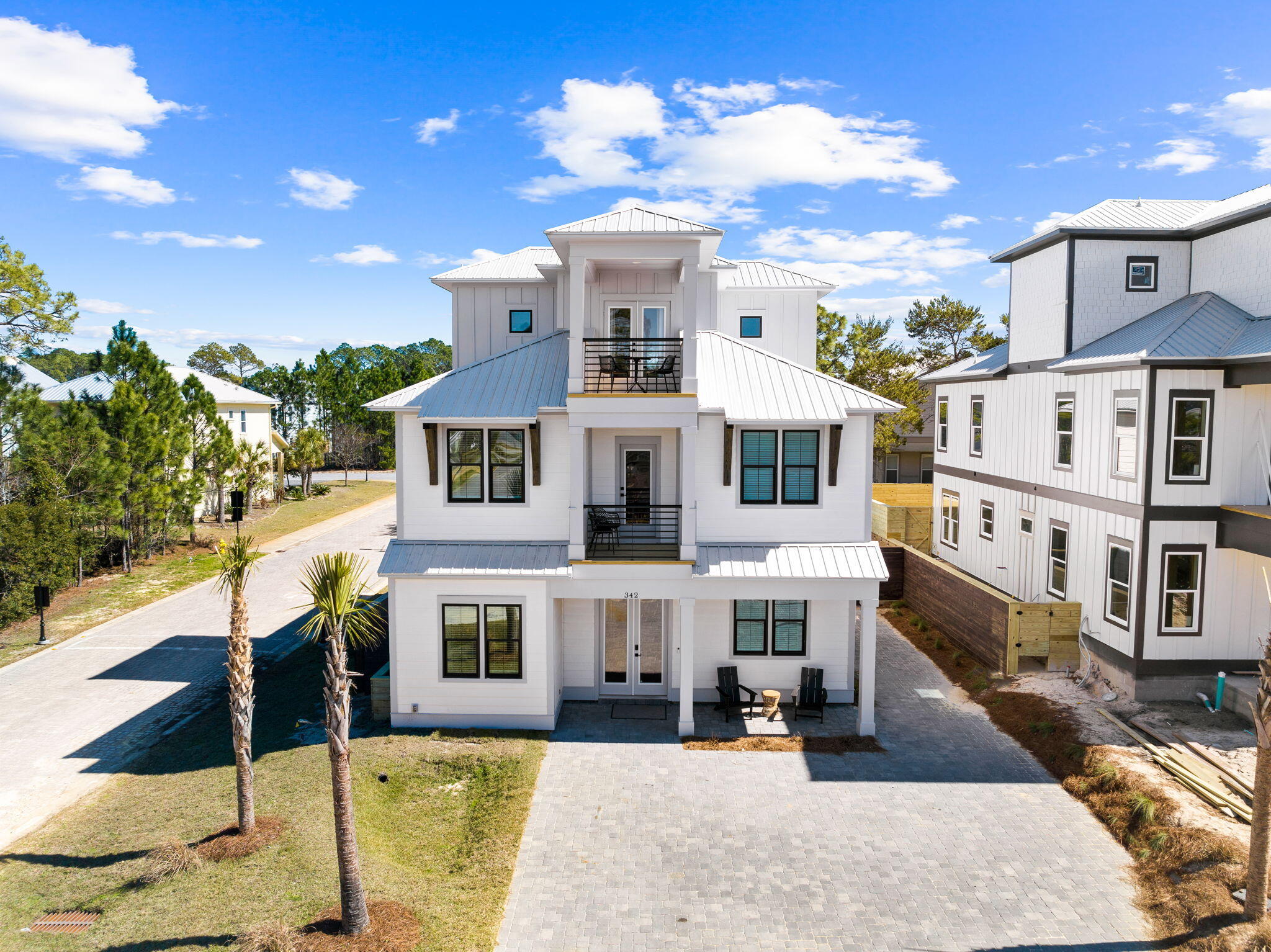 Welcome to 342 Miami Street in the private and gated Villas of Frangista in Miramar Beach, FL! This 2024 brand new construction presents an incredible investment opportunity with $50,000 in rental reservations already on the books and a projected annual rental income of $175,000+. Situated on a spacious corner lot, this coastal meets boho designed home offers a perfect blend of luxury and comfort.This stunning property boasts 7 bedrooms, 7.5 bathrooms, and 3230 square feet of thoughtfully designed living space. The interior features built-in bunk beds and game systems, creating an ideal retreat for families and vacationers alike. The private heated pool and hot tub offer a serene oasis for relaxation and entertainment.