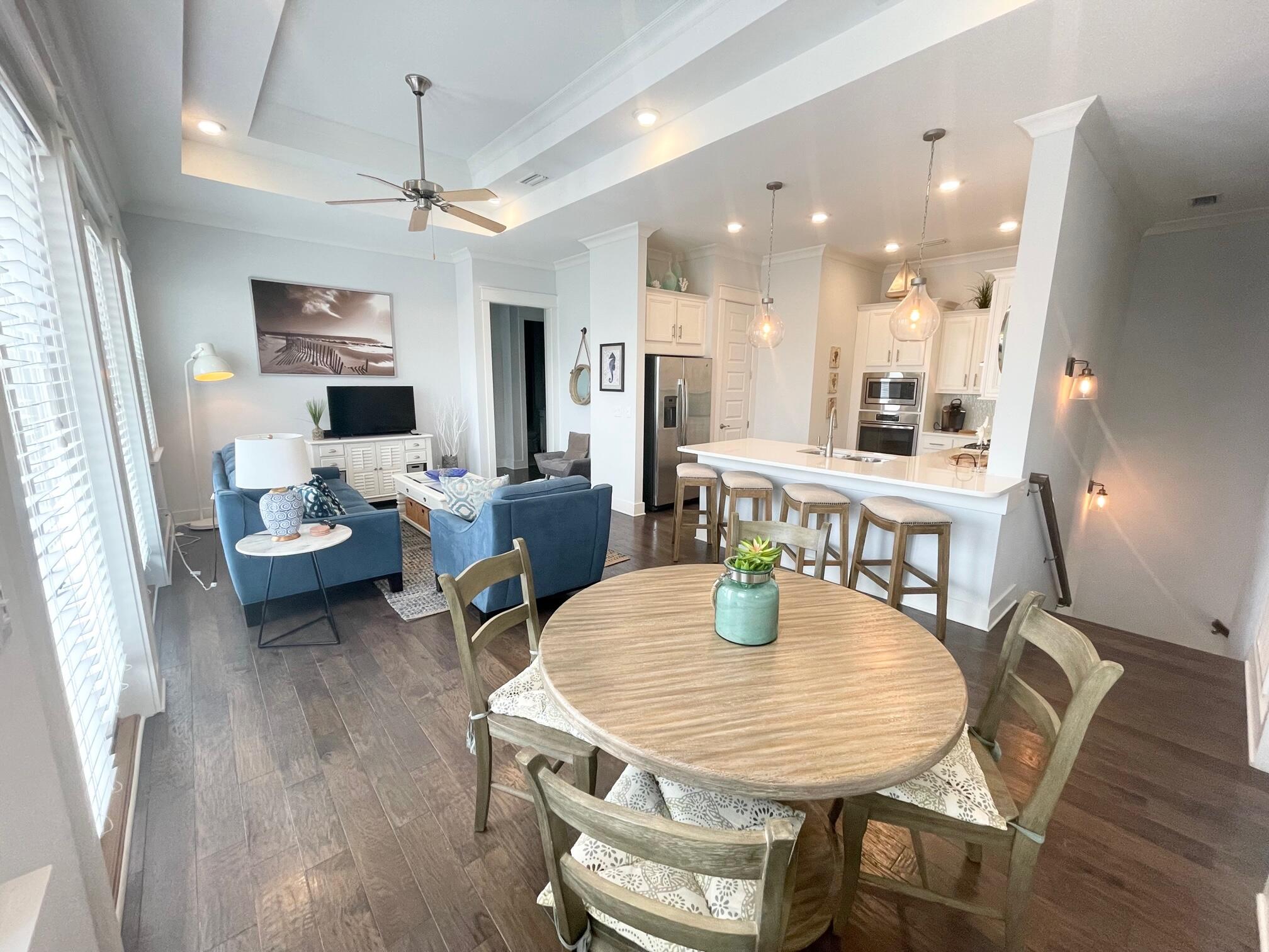 Don't miss out on this opportunity for a lucrative vacation rental or wonderful second home! This 2 bedroom, 2 bath townhome is located on 30A's East end in the highly desirable community of Prominence. Featuring a light and open concept living and dining space that is ideal for entertaining guests. The fully equipped kitchen includes a large breakfast bar, quartz countertops, and gas stovetop. The master ensuite offers dual vanities, a large walk-in closet, and a shower. The guest bedroom is complete with an abundance of natural light, wood floors, and direct access to the expansive balcony. Turn key and sold fully furnished!