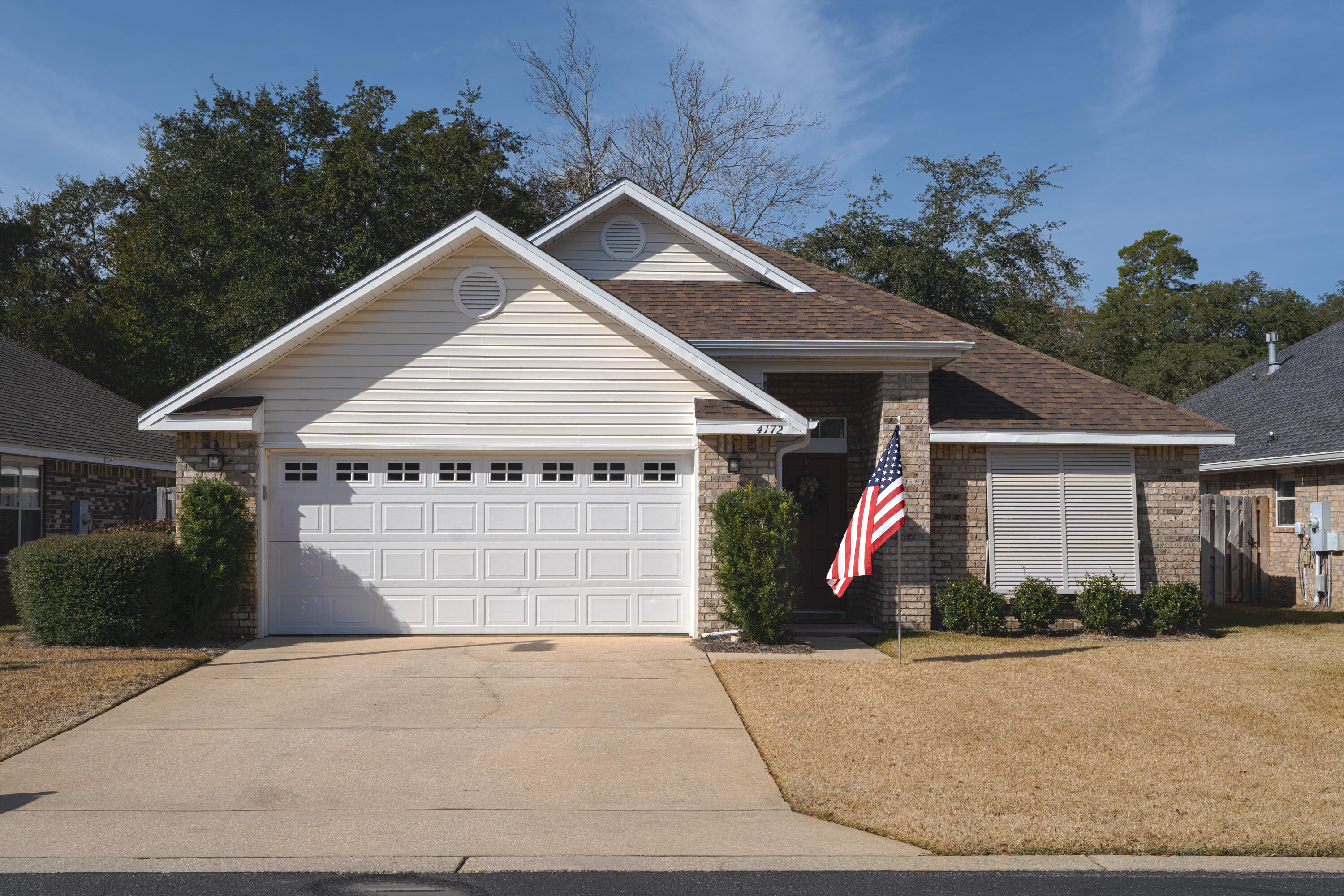 Well maintained all brick 3 bedroom 2 bath home nestled in Magnolia Forest S/D in the beautiful Bluewater Bay Golf Community. Just two blocks from the BWB marina with waterfront dining and only just down the street from the community pool, boat storage, pickle ball, & tennis courts. Large living/dining area with warm neutral colors, vaulted ceiling, plant ledges, and lots of windows. Kitchen is equipped with granite counters, gorgeous tile back splash, stainless Kenmore Elite appliances, and large center island open to the large family room which has gorgeous hardwood floors, & a marble trimmed gas fireplace. Large sliding doors open up to enclosed Florida room overlooking a colorful, landscaped fenced back yard. New roof, updated elec box, newer water heater and HVAC too.