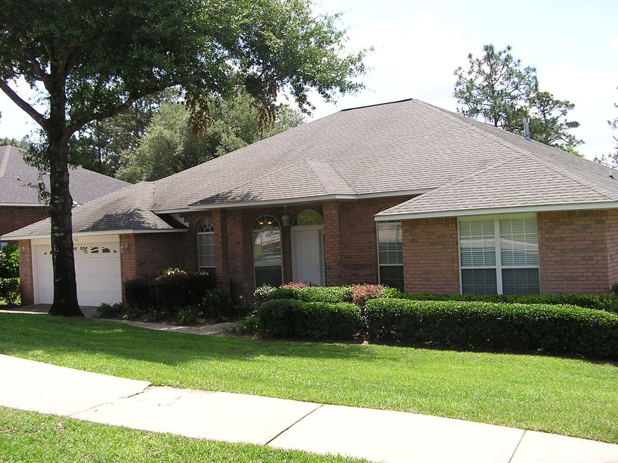 MOVE IN READY ON SOUTH-SIDE OF I-10. Spacious open split plan boasts 4 bedrooms and 3 full baths. Great room features fireplace and plant ledges. Double French doors open to generous Florida Room looking out to the fenced backyard. This home features two living areas--just perfect for a growing family! Spacious open kitchen offers tons of cabinets, separate pantry, lots of counter work space and an inland. Plenty of space for both informal and formal dining. The 2nd and 3rd bedrooms share a hall and bathroom. The 4th bedroom sits off to itself and offers its own full bath so it is ideal for a house-guest, teenager or mother-in-law suite. Generous master bath features separate tub and shower, double vanities and large walk-in closet. Additional features include microwave, recessed light