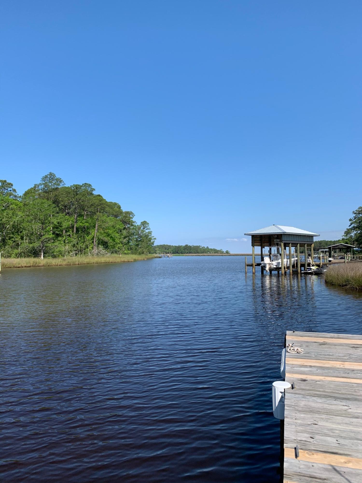 WATERFRONT on Tucker Bayou in the heart of Point Washington. This one won't last long... properties on the water are hard to find in this desirable neighborhood. Large lot in Eden Estates, easy access to Choctawhatchee Bay and Intracoastal Waterway. 3 bedroom & 3 baths, vaulted great room, 2 screened porches, mancave and tons of storage. Brand new boat lift, hot tub and room for pool if desired! Point Washington is a pristine locale with huge live oaks and magnolias, surrounded by Point Washington State Forest, private and serene, yet only 5 minutes to Seagrove Beach.