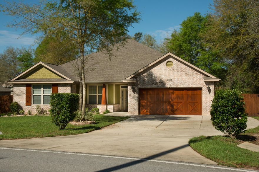 First Place Parade of Homes Winner is waiting for a new family. This Gulf Power Earth Cents certified home features 4 bedroom and 2.5 baths. The award winning builder of this home (Watree Homes) included all the features you have come to expect and more.There is porcelain tile in all wet areas, designer cabinets with soft-close drawers, granite kitchen counter tops, stainless steel appliances, an oversized pantry and travertine back-splash are just the beginning. The home also has tray ceilings with crown molding, Shaw Frieze carpeting, ceiling fans in the great room and all bedrooms, cultured marble bathroom vanity tops, and master bath with garden tub and separate shower.