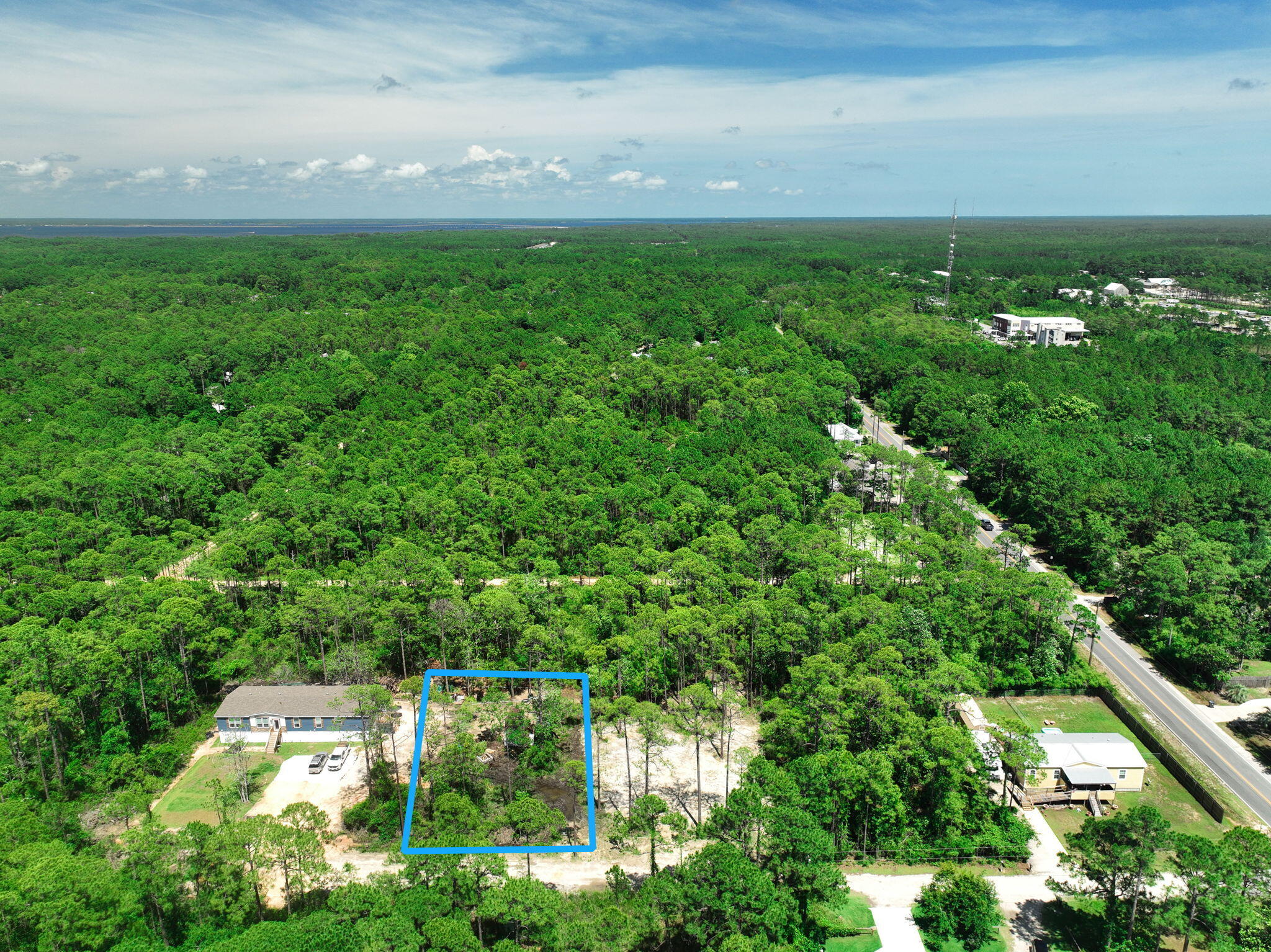 If you're looking for privacy, nature, and proximity to the water, this lot has it all. Tucked away just 2 miles north of Hwy 98, this .29-acre property offers a peaceful setting while still being conveniently close to everything Santa Rosa Beach has to offer. You're less than 4 miles from Ed Walline Beach Access and Topsail Hill Preserve State Park, and only about a mile from Cessna Landing, a county park on the bay with a boat launch, fishing, picnic areas, playground, and more. Plus, you're just minutes from grocery stores, restaurants, and local shops. Need more space? The neighboring lots (17 & 18) are also available, giving you the opportunity to own a combined half-acre to build your ideal coastal retreat. Contact us today for details!