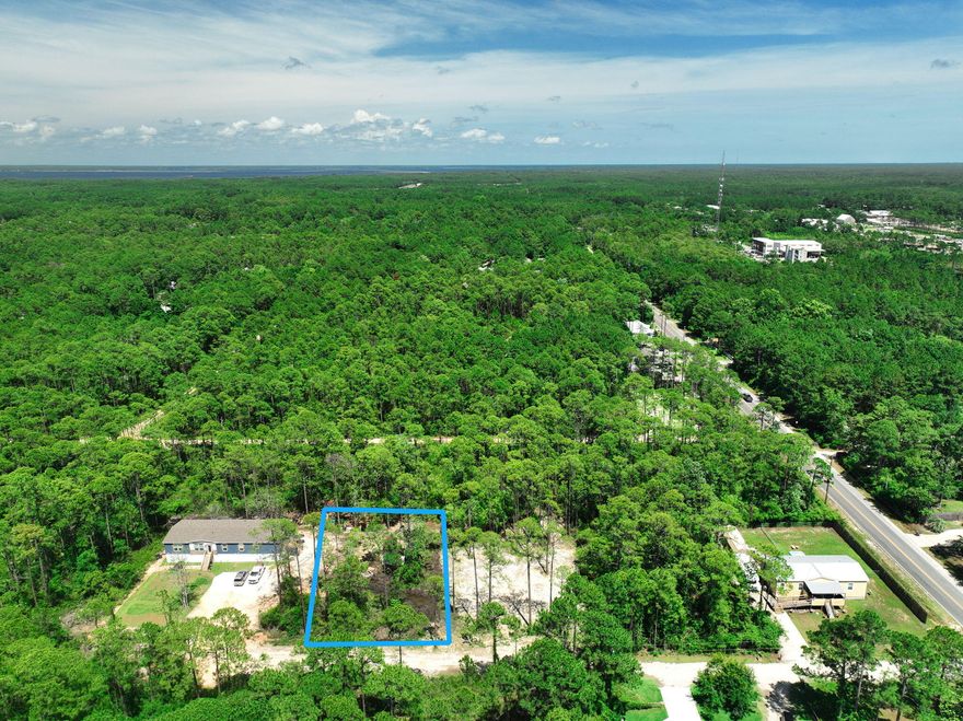 If you're looking for privacy, nature, and proximity to the water, this lot has it all. Tucked away just 2 miles north of Hwy 98, this .29-acre property offers a peaceful setting while still being conveniently close to everything Santa Rosa Beach has to offer. You're less than 4 miles from Ed Walline Beach Access and Topsail Hill Preserve State Park, and only about a mile from Cessna Landing, a county park on the bay with a boat launch, fishing, picnic areas, playground, and more. Plus, you're just minutes from grocery stores, restaurants, and local shops. Need more space? The neighboring lots (17 & 18) are also available, giving you the opportunity to own a combined half-acre to build your ideal coastal retreat. Contact us today for details!