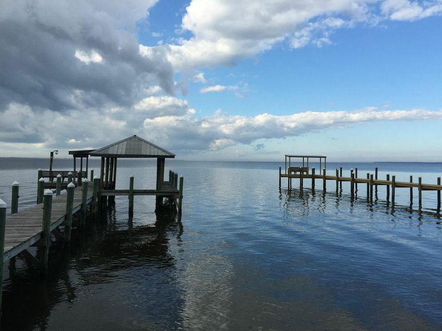 Great Bay Front lot in the beautiful Bay Harbour community. Lot has a dock and seawall in place. Perfect place to enjoy those wonderful sunsets all year long! Community has many amenities including 175 acres of nature preserve, tennis and basketball courts, walking trails, and outside storage units. Conveniently located just a short drive from the Emerald Coast beaches! Build your dream home with a bay front view!