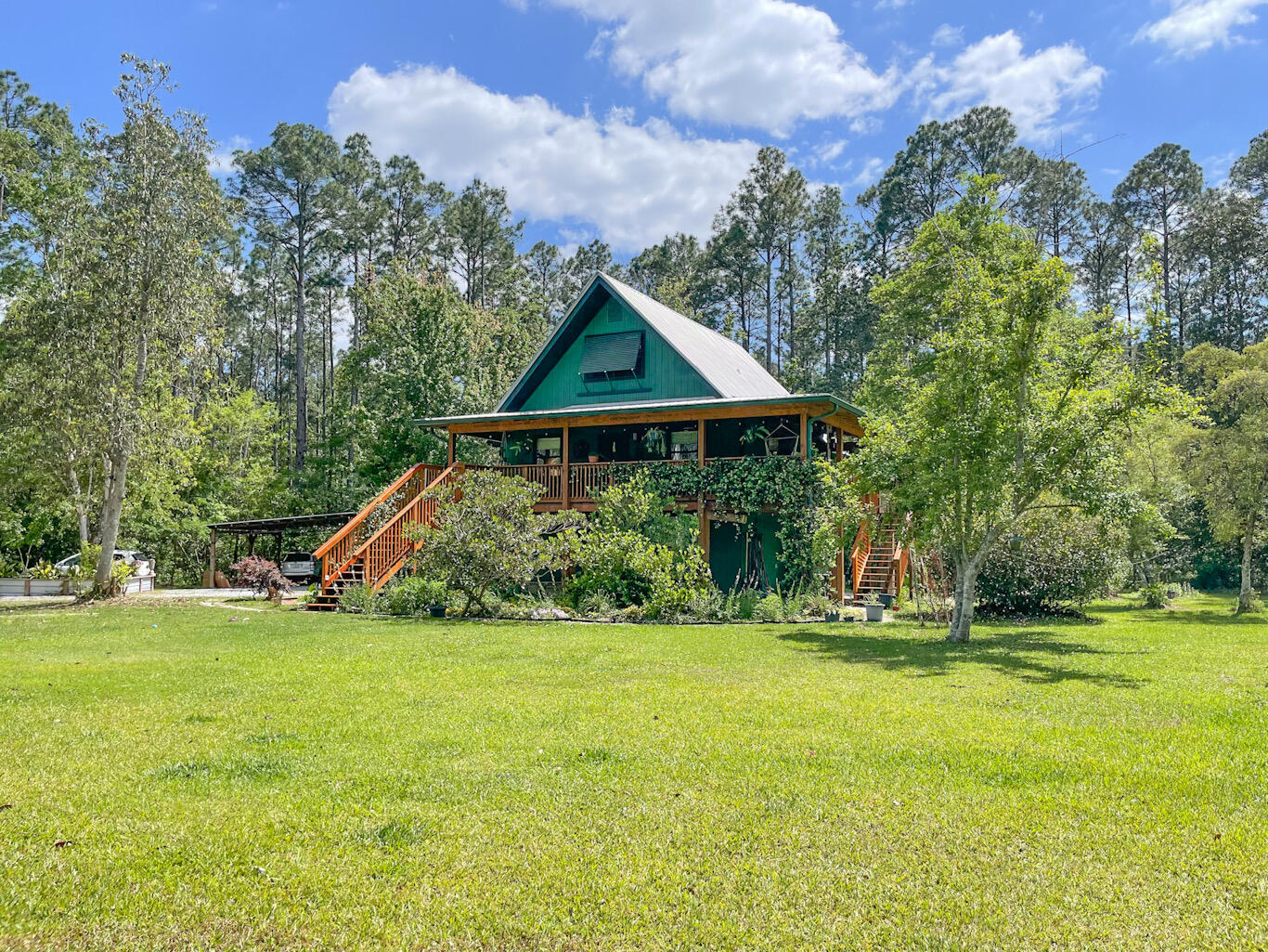 A quarter of a mile from Black Creek boat landing and sitting on over 2.5 acres this property is perfect for anyone who loves the outdoors. A covered wood deck wraps around the front and side of the home overlooking the well kept landscaping that provides gorgeous views and privacy. Tons of storage space can be found in the detached 2 car garage with loft, and under the stilt home. Schedule a showing or request the video tour now!$50 of your monthly rent is put towards the Resident Benefits Package. All residents are enrolled in the package which includes renters liability insurance, credit building with timely rent payments, up to $1M Identity Theft Protection, HVAC air filter delivery (for applicable properties), move-in utility concierge service, our resident rewards program, and