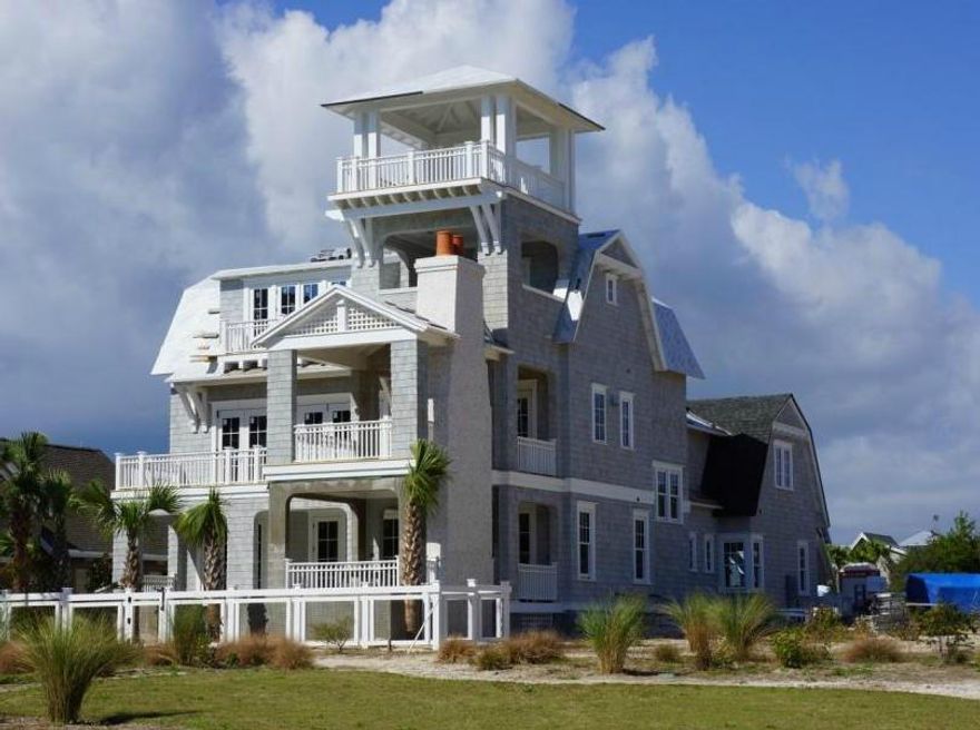 Brand new home in Gulfview at Watersound Beach - Founders Plan. This beautiful home has 6 bedrooms, 6/2 bathrooms with 3717 square feet of living space, 1260 square feet of porches and a 2 car garage. There are beautiful porches overlooking the terrace and the pool. Salt-chlorinated pool has a negative edge and gas heater. The great room is on the second level and opens up to a porch with an outdoor fireplace. Enjoy the peace and tranquility of the 3rd level master suite with private porch. Interior features include granite and limestone countertops, Dacor and Bosch appliances, custom molding, precast concrete pavers and European wire brushed oak flooring throughout the home. Exterior will have mahogany front door, cedar shake siding with stainless fasteners