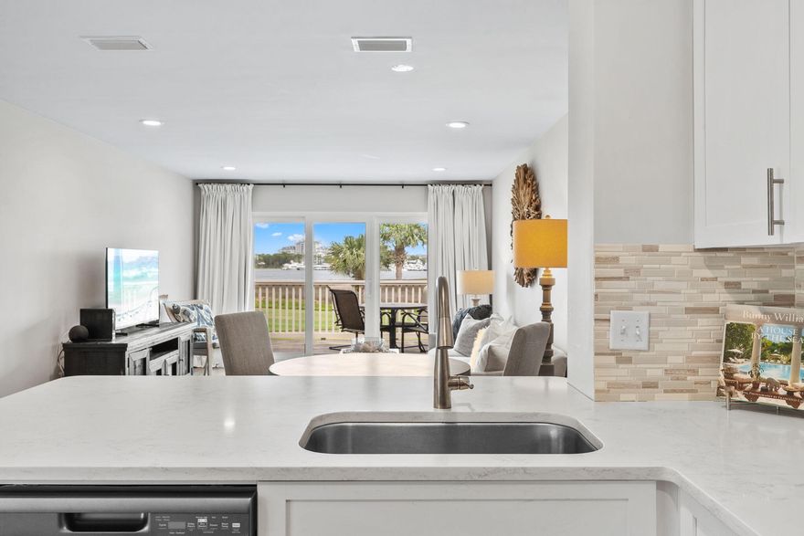 New Listing! Turn Key! Short-Term Rental! Golf Cart Included! Welcome to 821 Harbour Point Drive, located in the highly renowned Sandestin Golf and Beach Resort on Florida's Emerald Coast. This beautifully remodeled, top tier, waterfront condominium offers breathtaking panoramic views of Choctawhatchee Bay and Links Golf Course where you can enjoy both sunrises and sunsets from your private balcony. Designed for comfort and style, the open-concept layout features a spacious living area filled with natural light, a fully equipped kitchen, and an inviting bedroom retreat overlooking tranquil lake views--perfect after a day of golf, boating, or relaxing on the beach. Harbour Point is one of Sandestin's most charming golf-cart communities, providing a peaceful escape with a community pool