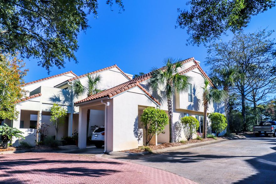 This beautiful end unit condo is located in the desirable 24 hour gated community of Tops'l Beach & Racquet Resort. In the Tennis Village section. This floor plan is full of natural light and has two master bedrooms one on each floor. The second floor has a bonus room that can be used as an office space or to accommodate company.  The kitchen has been completely updated. Short distance to the tennis court, clubhouse and indoor/outdoor heated pools.Near shopping centers, hospital, gulf courses, State Parks and fine dining. Locals and visitors also enjoy in the surrounding area other outside activities like dolphin cruises, fishing trips, jet-skiing excursions, parasailing adventures and hiking.