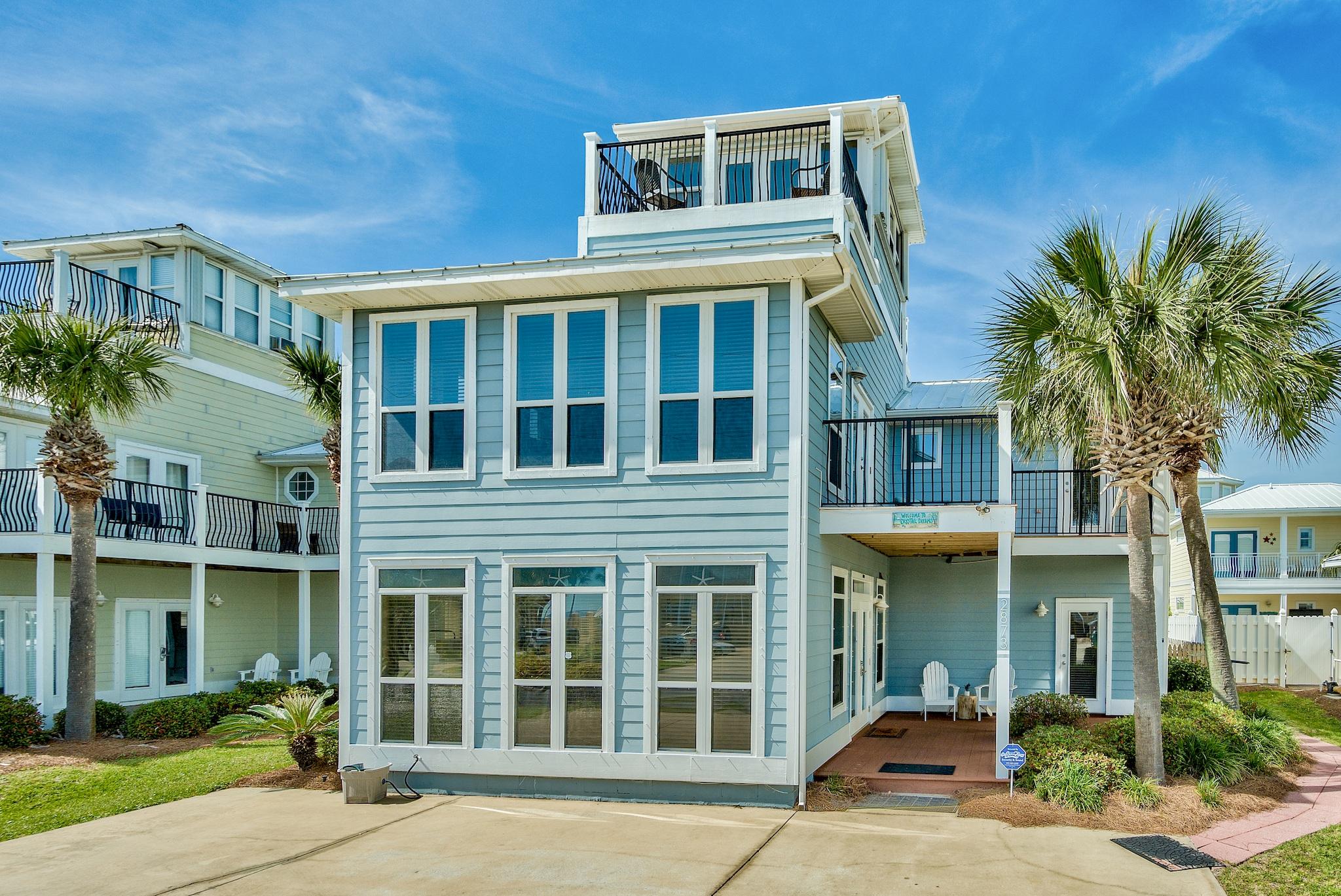 When looking for both location and an incredible rental investment, this home has it all! This 5-bedroom beach house, located directly on Scenic 98, has consistently grossed over $150K+ over the last 5 years of ownership. Its ideal location, steps from Shirah beach access, makes this home one of the most sought-after rental properties in Crystal Beach, which is evident by its 5-Star VRBO reviews. Plus, it is amazingly close to coastal restaurants, a world class spa, shopping, entertainment & gorgeous Henderson Beach State Park. The home provides a perfect set-up for entertaining with a courtyard pool, outdoor pergola, grilling area & pool house, not to mention views of the Gulf from all 3 levels. There is an eagle's nest, 2 bonus rooms & plentiful outdoor spaces to enjoy coastal living!