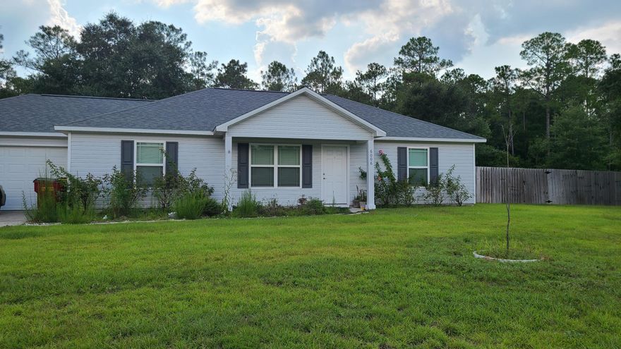 Welcome to this custom energy efficient 3-bedroom 2-bathroom home built in 2017! Home offers a split bedroom floor plan with a large family room / dining area combination, granite counter tops with beautiful solid wood cabinetry and pantry in the kitchen, garden tub located in master bath, walk in closets, vaulted ceiling, laundry located in the spacious garage. This property offers a half-acre lot, sprinkler system and a large fenced in back yard for your enjoyment.